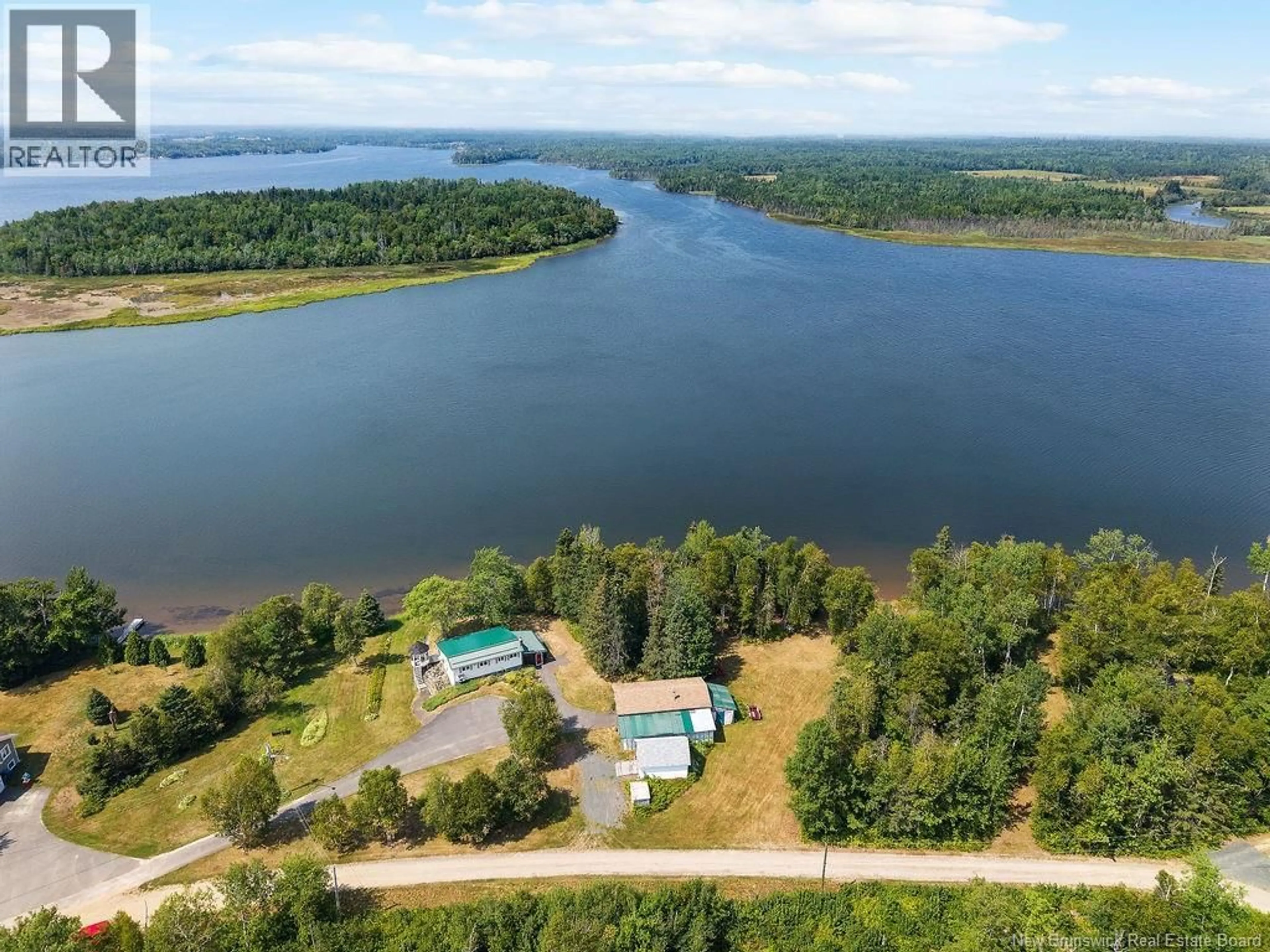 A pic from outside/outdoor area/front of a property/back of a property/a pic from drone, water/lake/river/ocean view for 117 COMEAU POINT ROAD, Pokemouche New Brunswick E8P1E9