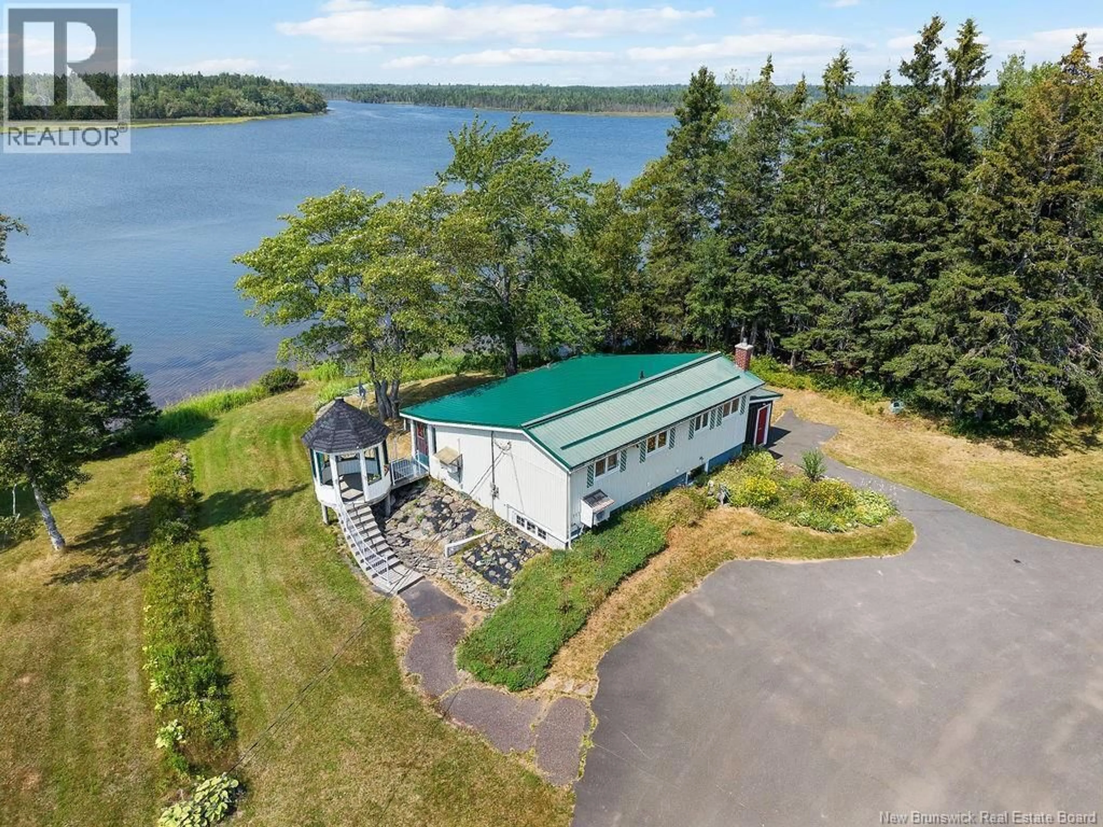 A pic from outside/outdoor area/front of a property/back of a property/a pic from drone, water/lake/river/ocean view for 117 COMEAU POINT ROAD, Pokemouche New Brunswick E8P1E9