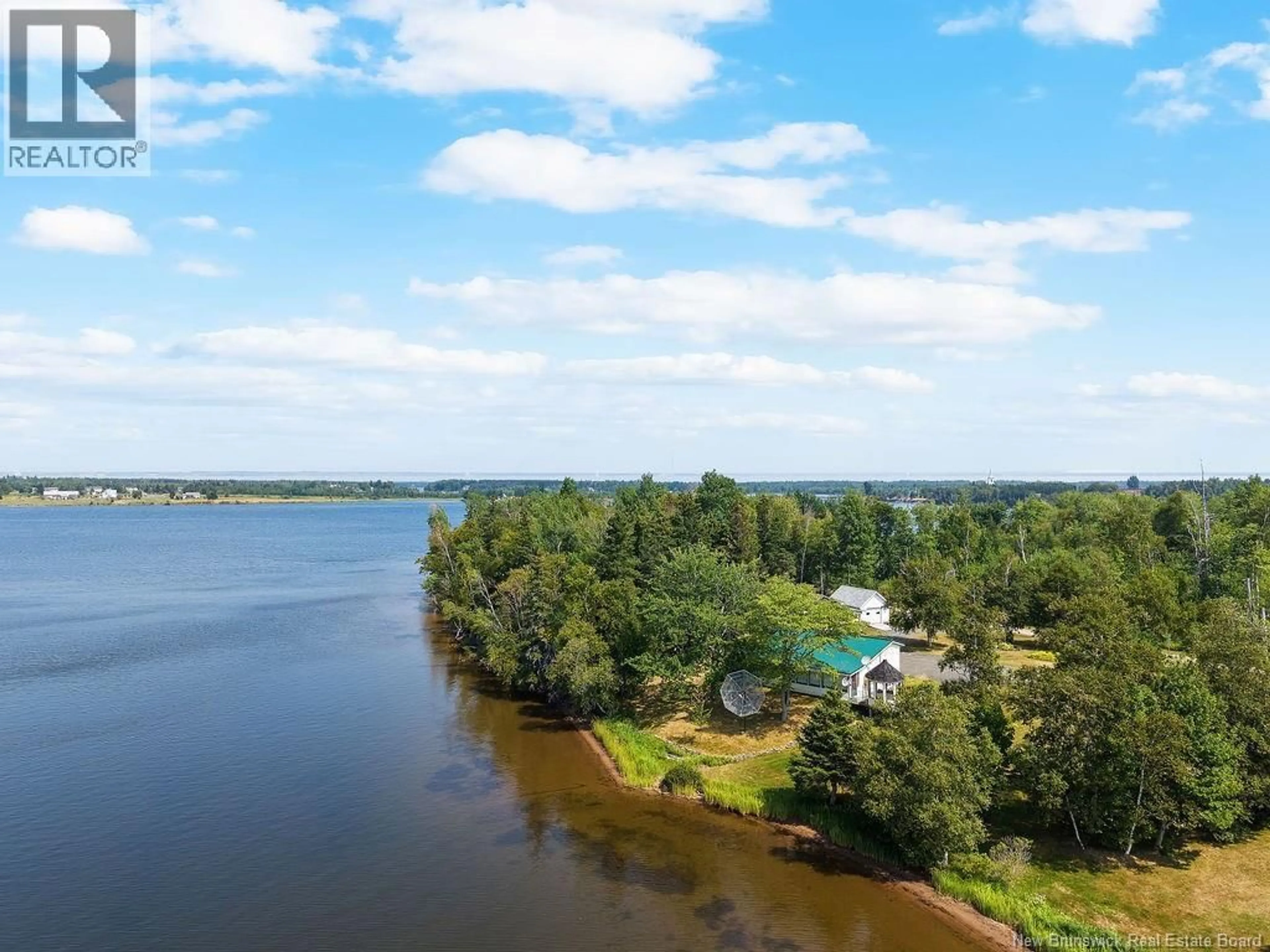 A pic from outside/outdoor area/front of a property/back of a property/a pic from drone, water/lake/river/ocean view for 117 COMEAU POINT ROAD, Pokemouche New Brunswick E8P1E9