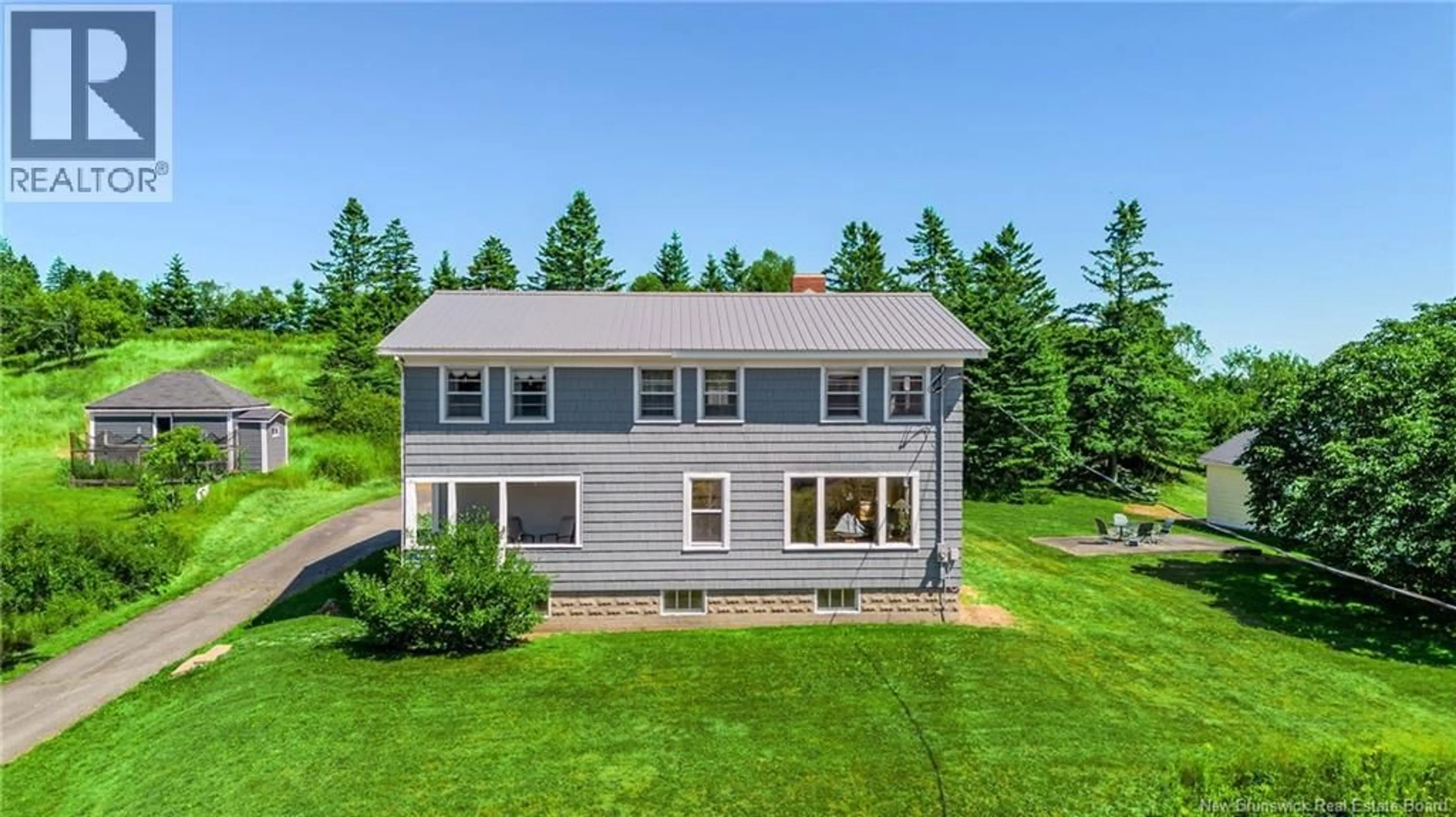 A pic from outside/outdoor area/front of a property/back of a property/a pic from drone, water/lake/river/ocean view for 639 MAIN STREET, Beaver Harbour New Brunswick E5H1N8