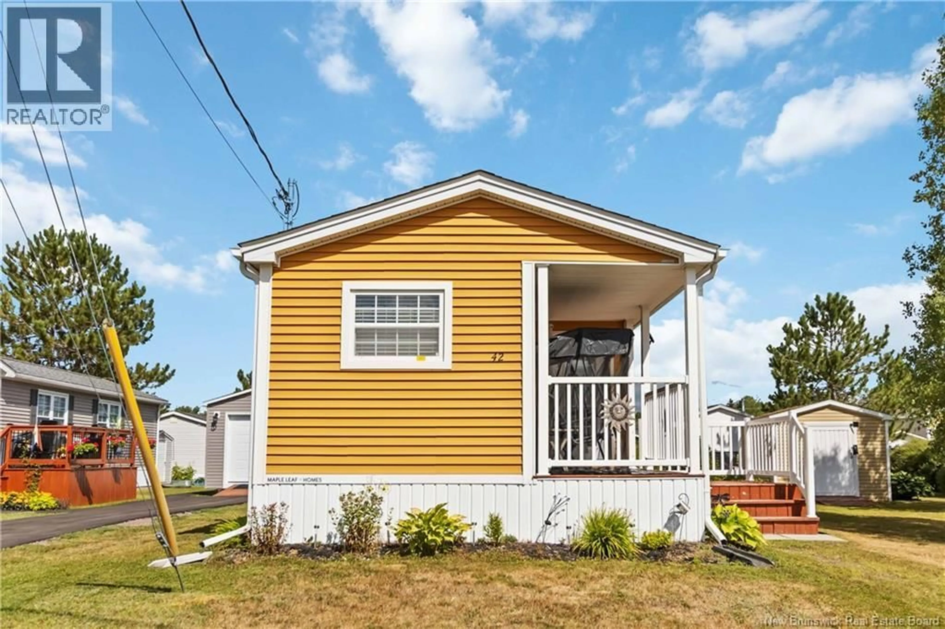 Home with vinyl exterior material, street for 42 ANDRÉ, Dieppe New Brunswick E1A7C4