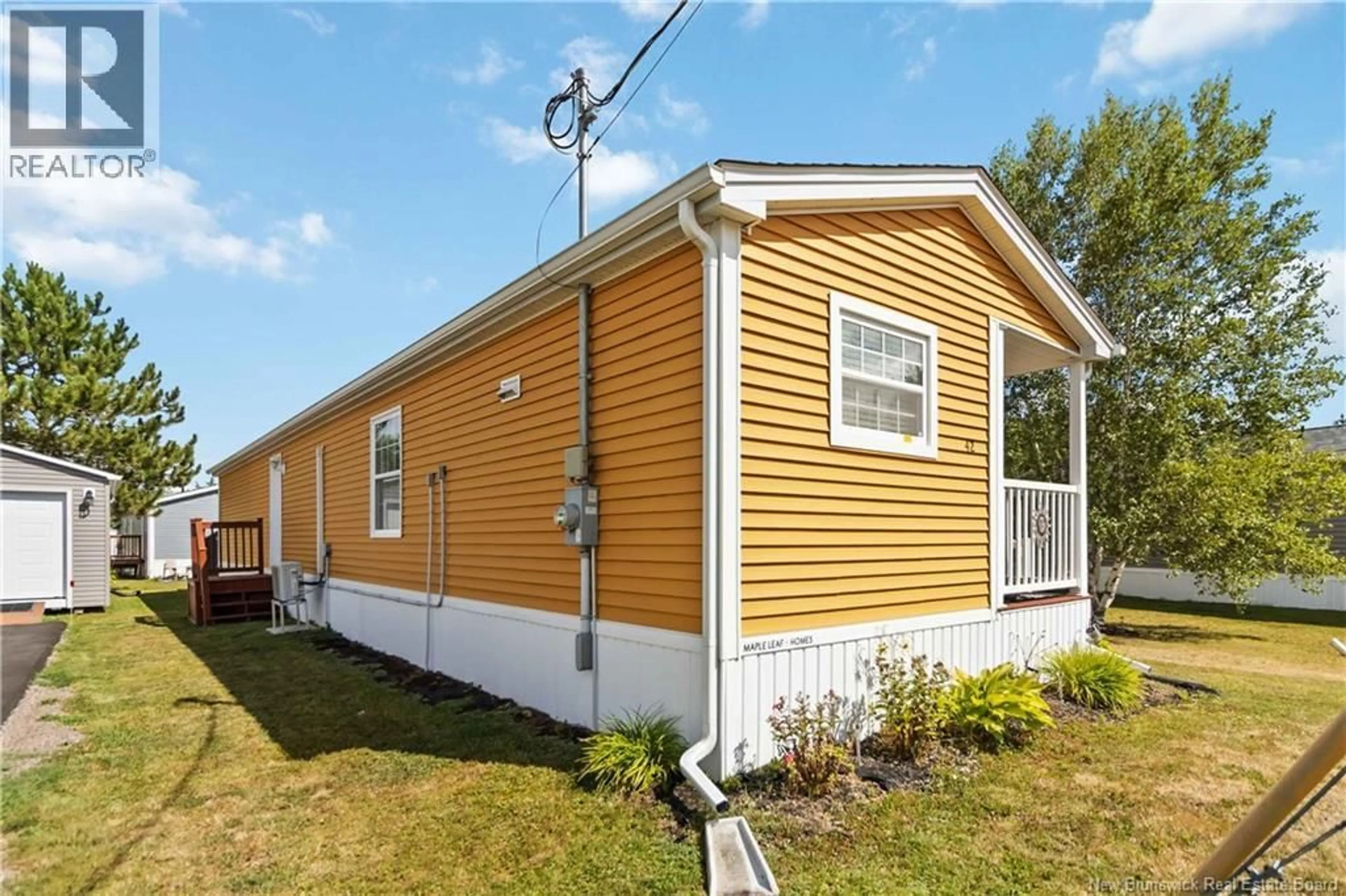 Home with vinyl exterior material, street for 42 ANDRÉ, Dieppe New Brunswick E1A7C4