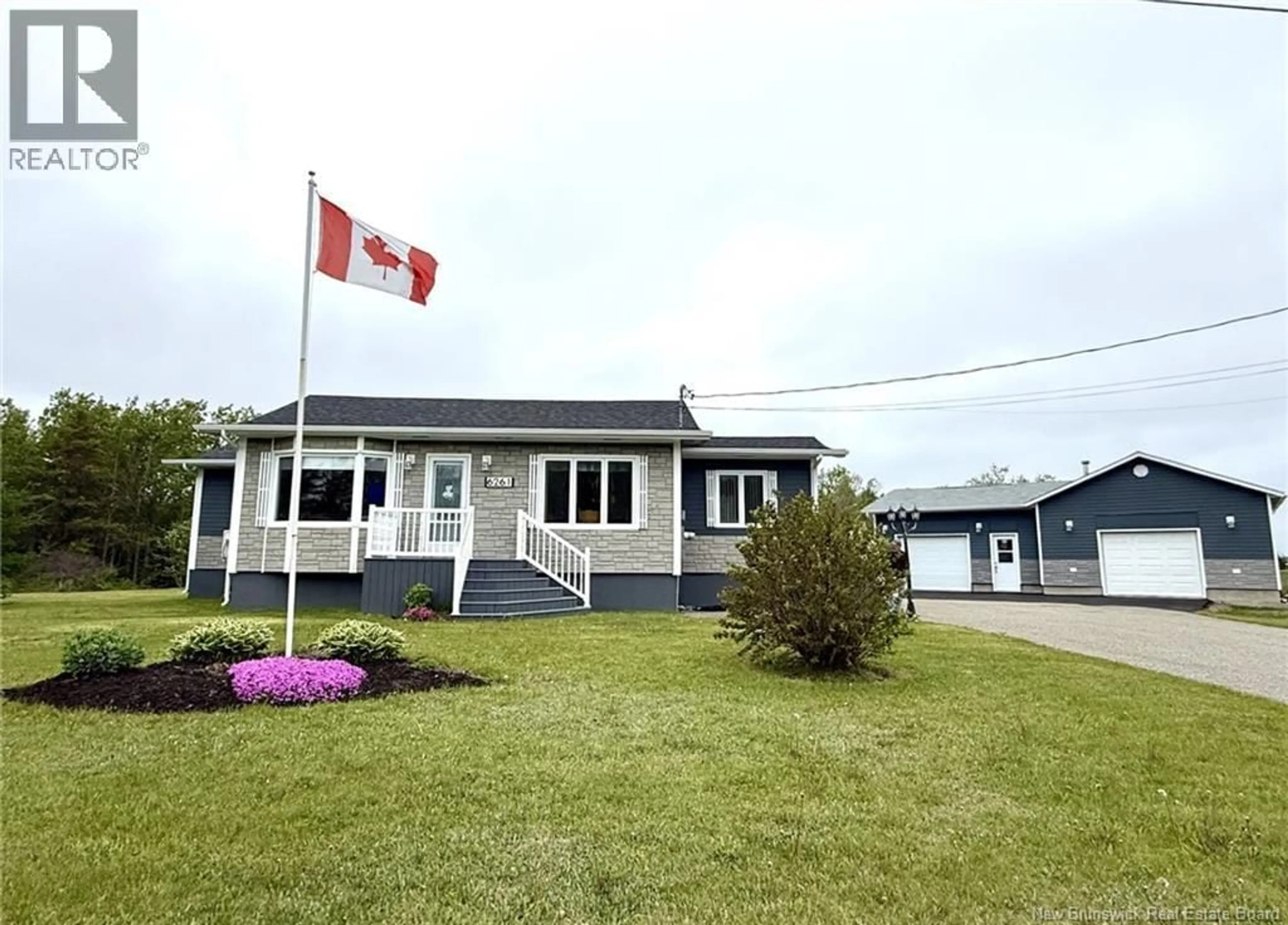 A pic from outside/outdoor area/front of a property/back of a property/a pic from drone, building for 6261 ROUTE 313, Petite-Lamèque New Brunswick E8T2P4