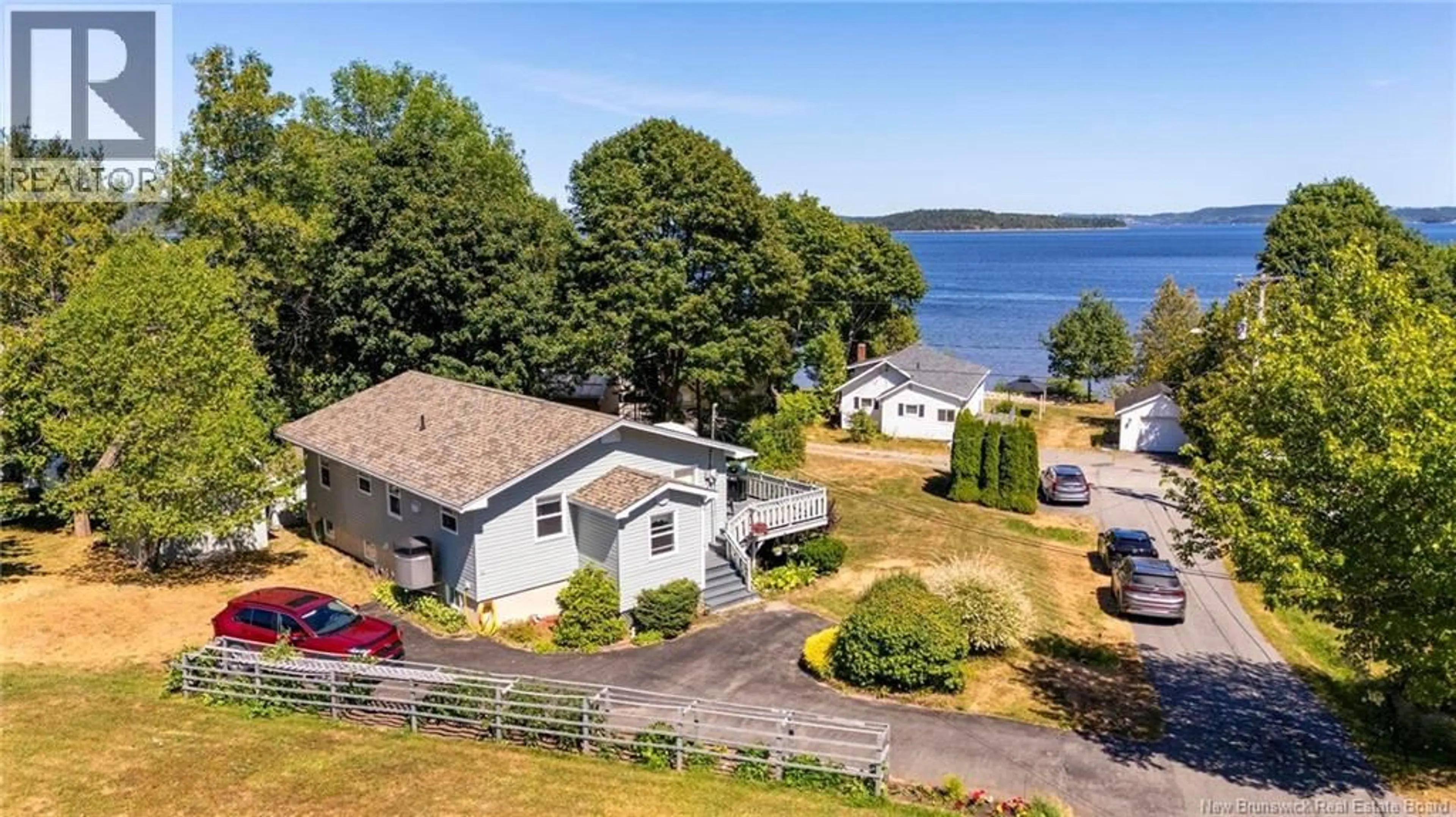 A pic from outside/outdoor area/front of a property/back of a property/a pic from drone, water/lake/river/ocean view for 5 KENWOOD ROAD, Grand Bay-Westfield New Brunswick E5K1M7