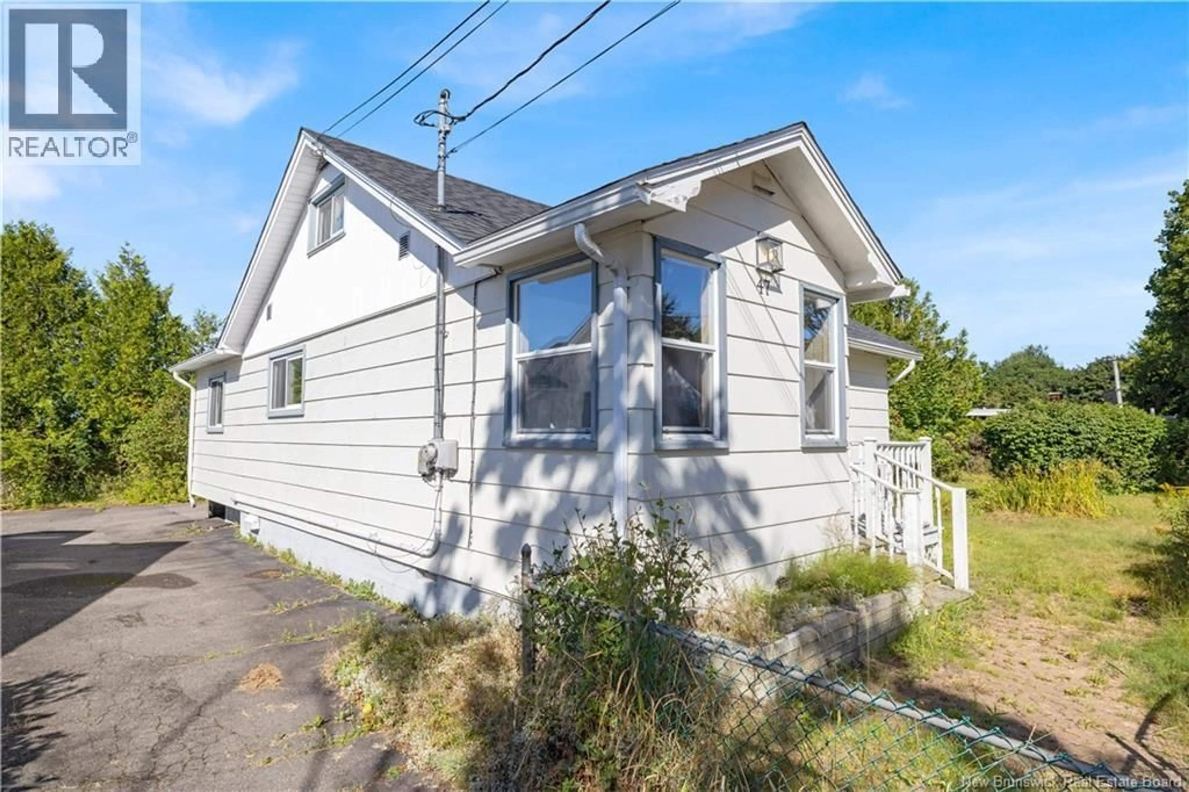 Home with vinyl exterior material, street for 47 PUGLSEY AVENUE, Saint John New Brunswick E2K2X1