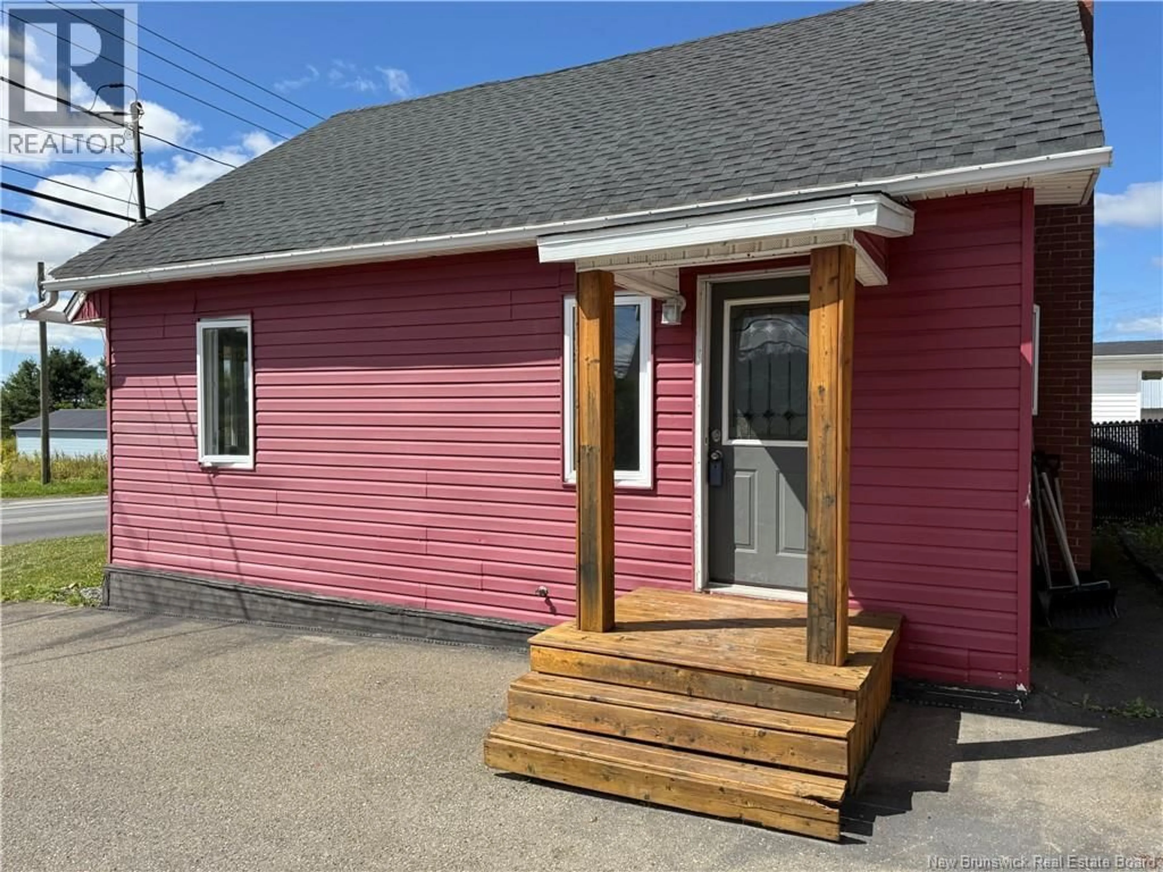 Home with vinyl exterior material, street for 219 TOBIQUE ROAD, Grand-Sault/Grand Falls New Brunswick E3Y1E8