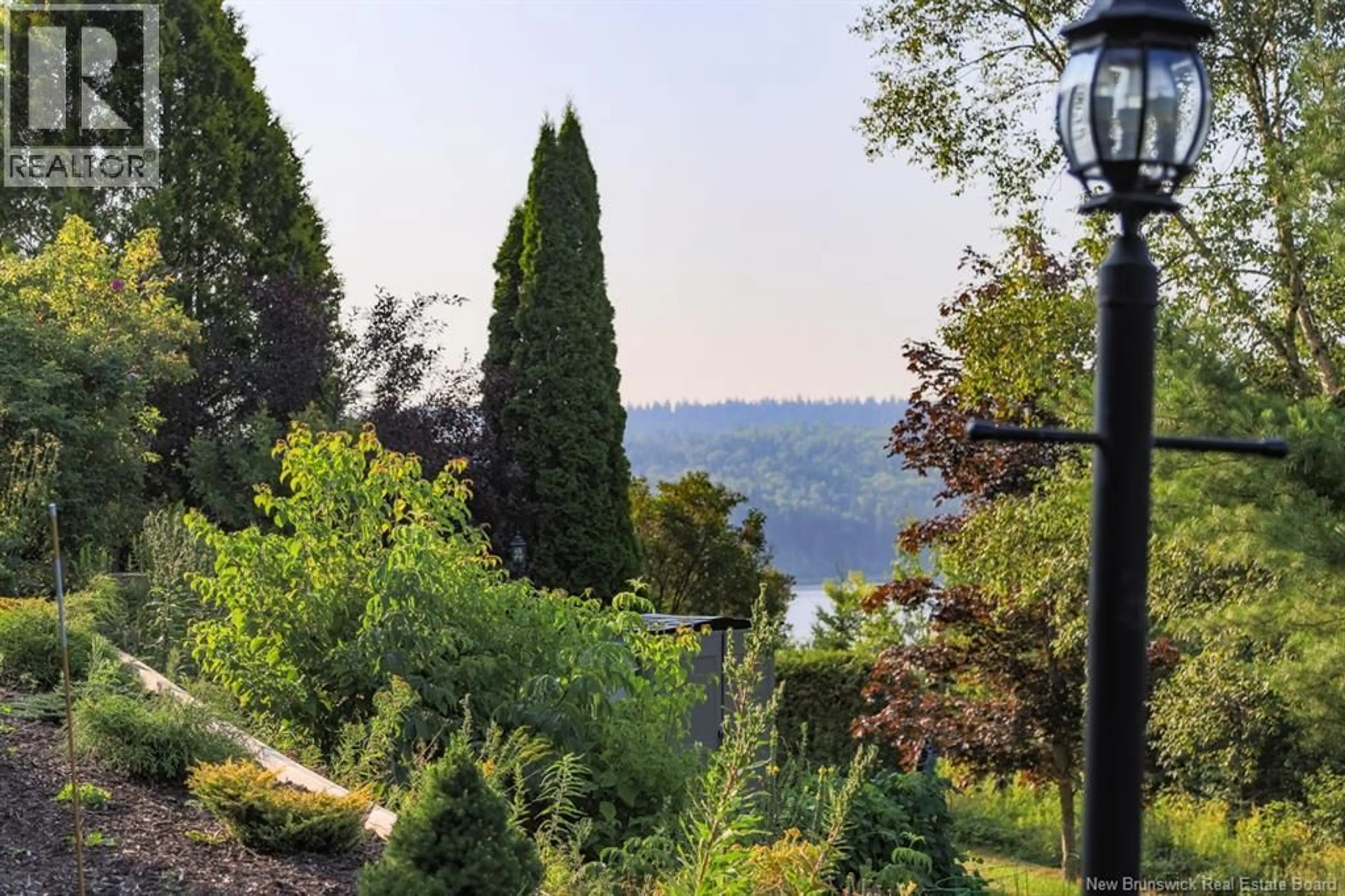 Patio, water/lake/river/ocean view for 23 NAIL FACTORY ROAD, Clifton Royal New Brunswick E5S2G8