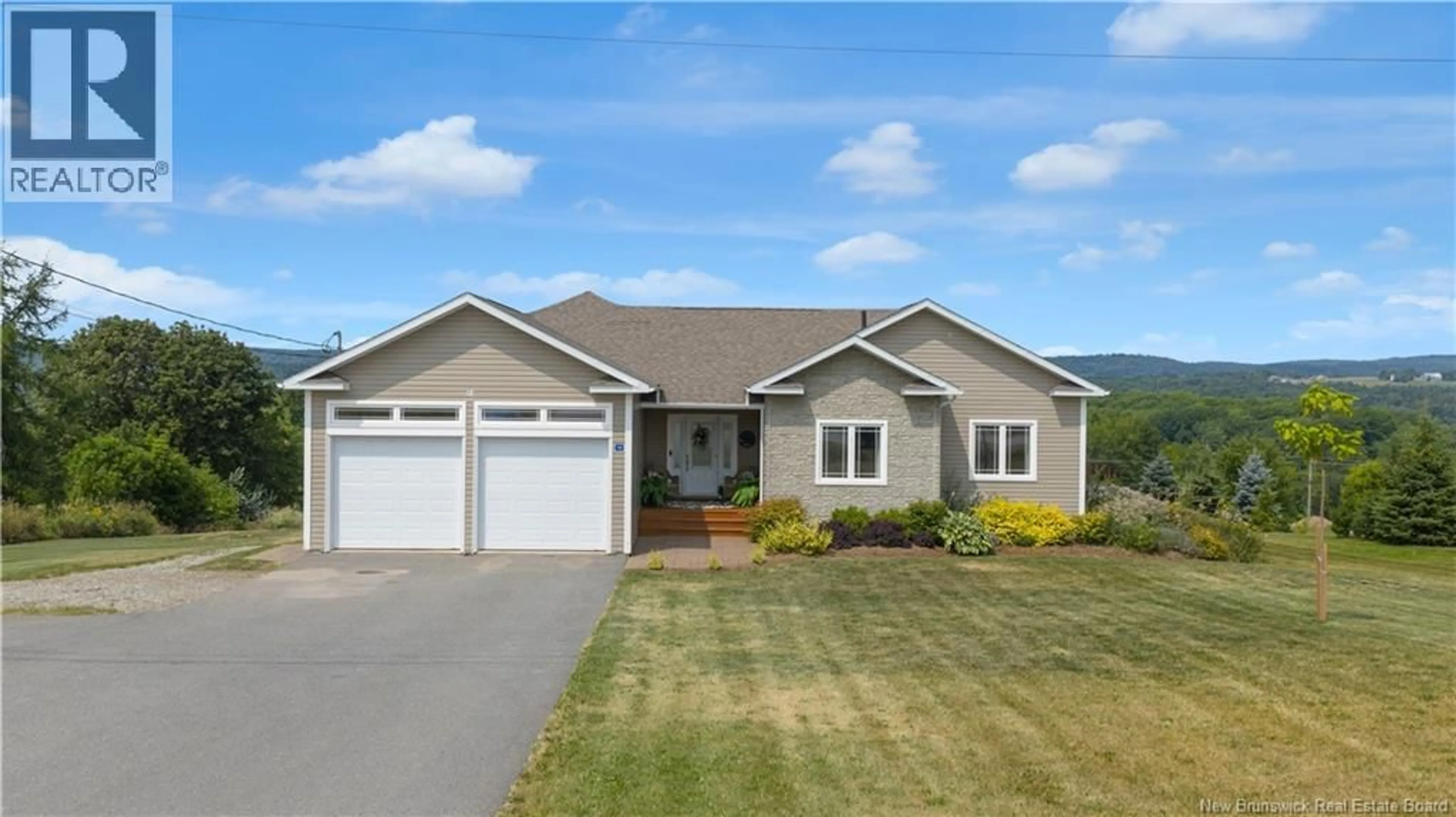 Home with vinyl exterior material, street for 18 KAREN STREET, Nauwigewauk New Brunswick E5N0L5