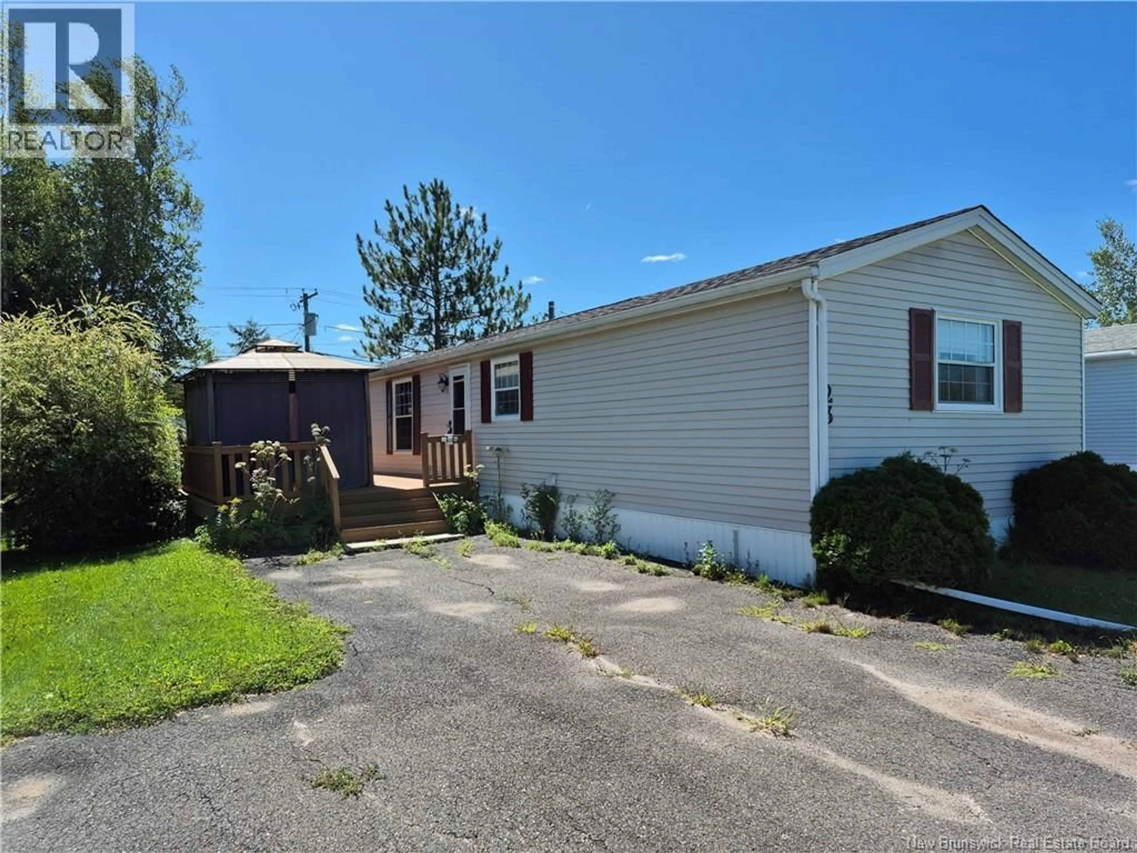 Home with vinyl exterior material, street for 23 TYLER STREET, Lincoln New Brunswick E3B6X4