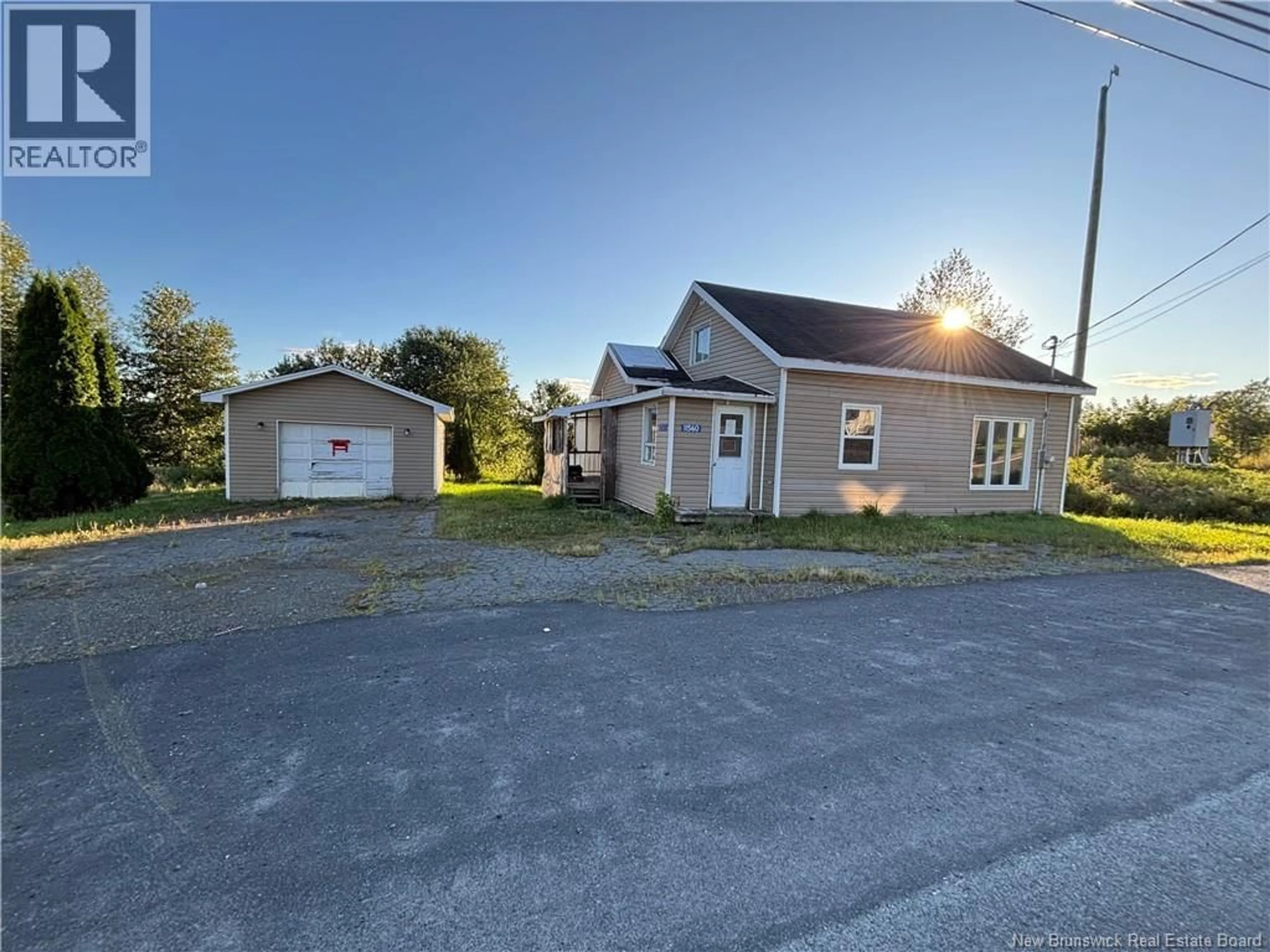 A pic from outside/outdoor area/front of a property/back of a property/a pic from drone, street for 11560 144 ROUTE, Saint-Léonard-Parent New Brunswick E7E2M8