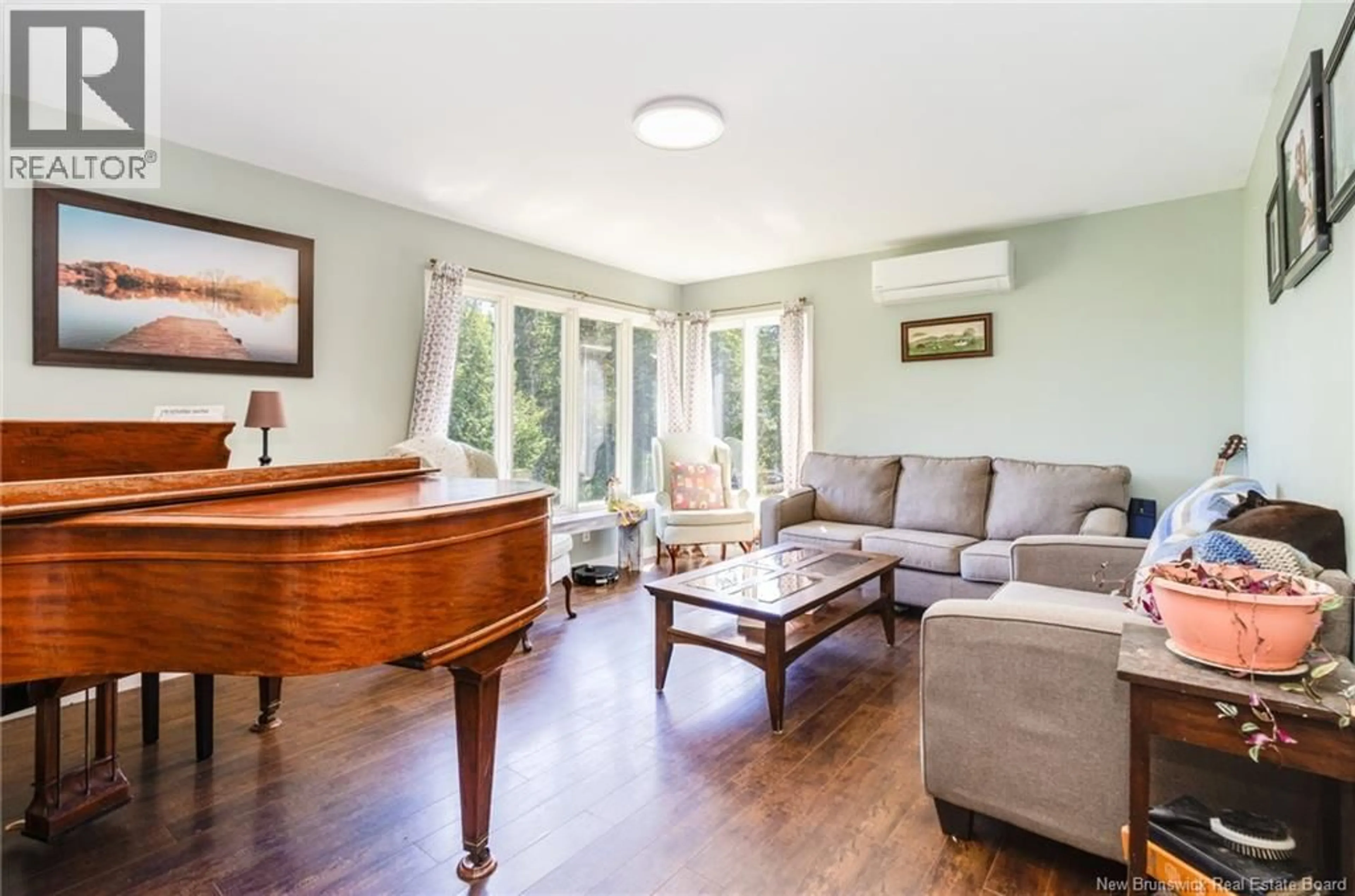 Living room with furniture, wood/laminate floor for 150 LOWER STONERIDGE ROAD, Burtts Corner New Brunswick E6L2P5