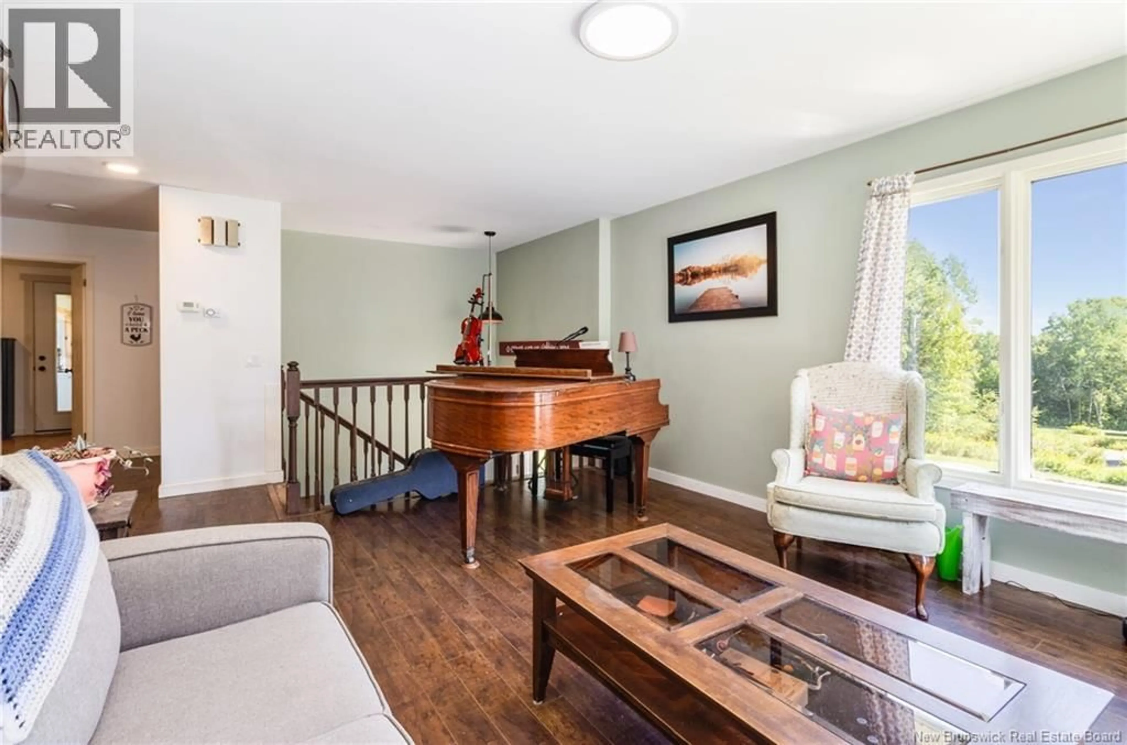Living room with furniture, wood/laminate floor for 150 LOWER STONERIDGE ROAD, Burtts Corner New Brunswick E6L2P5