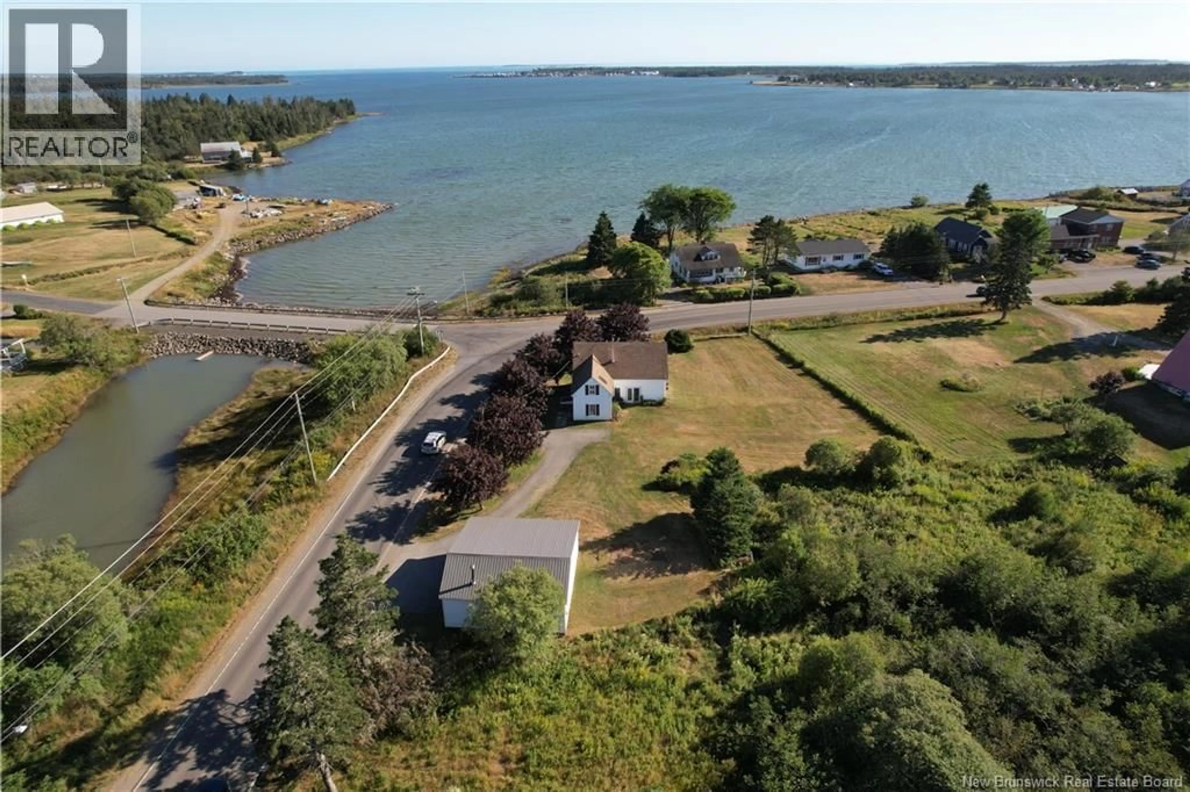 A pic from outside/outdoor area/front of a property/back of a property/a pic from drone, water/lake/river/ocean view for 1088 ROUTE 776, Grand Manan Island New Brunswick E5G1A5