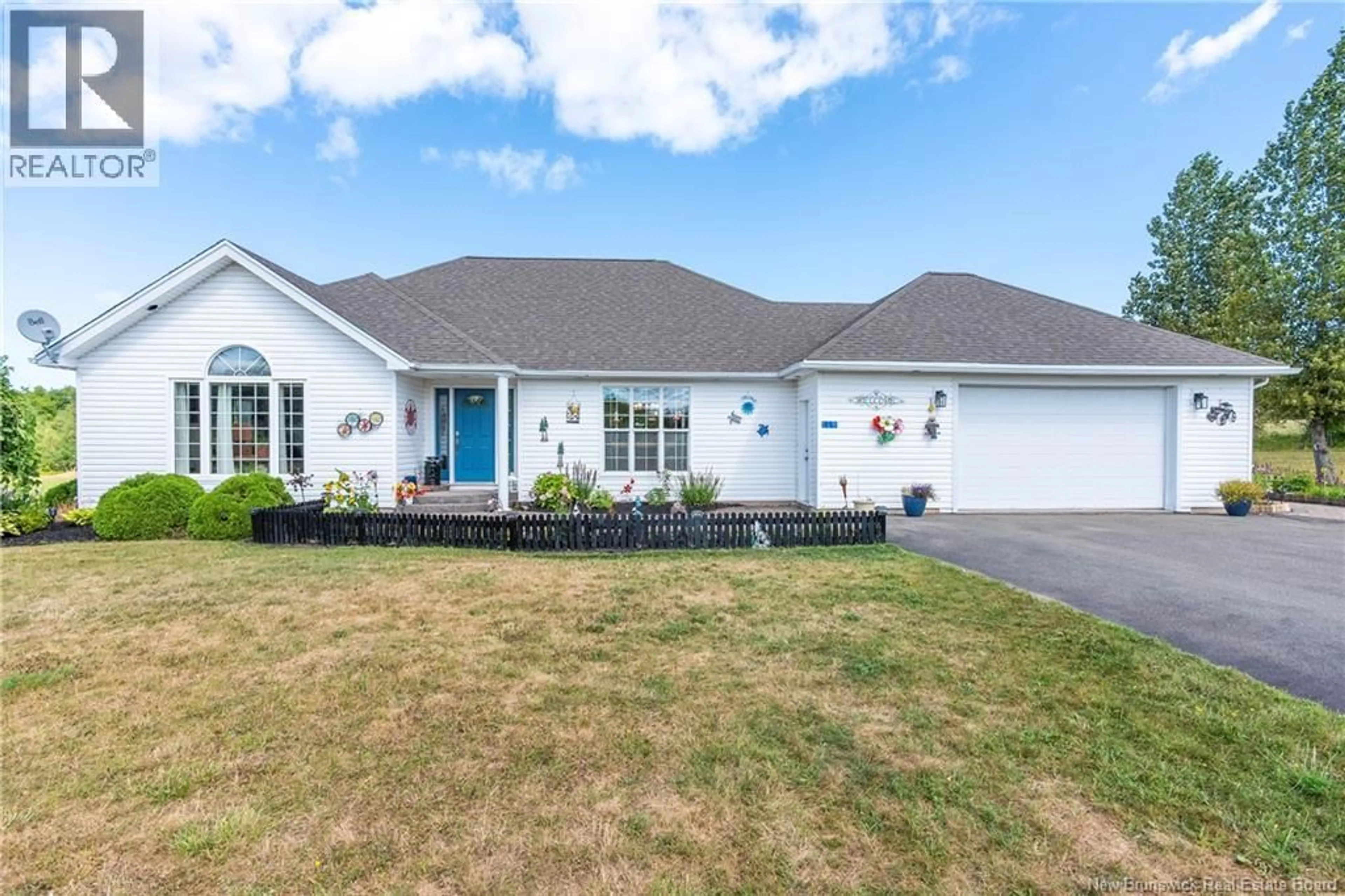 Home with vinyl exterior material, street for 119 SAINT GREGOIRE STREET, Saint-Grégoire New Brunswick E4V2R2