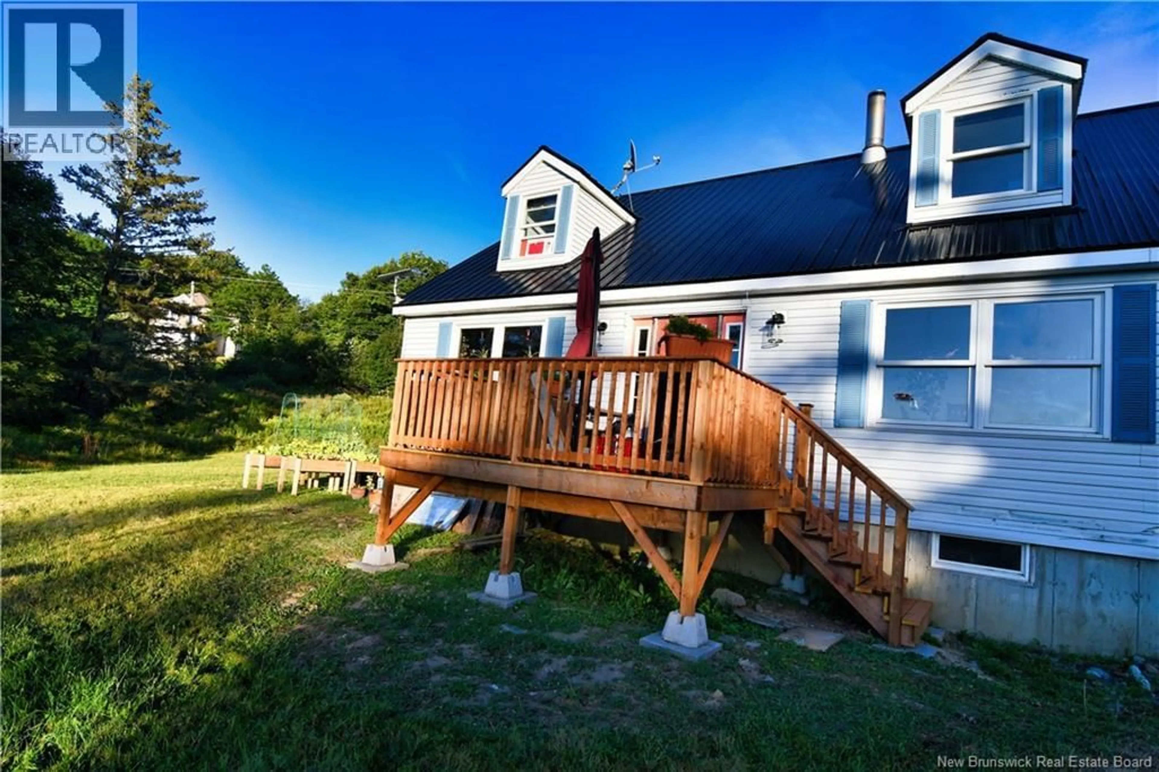 A pic from outside/outdoor area/front of a property/back of a property/a pic from drone, unknown for 175 NORTH ROAD, Welshpool New Brunswick E5E1C4