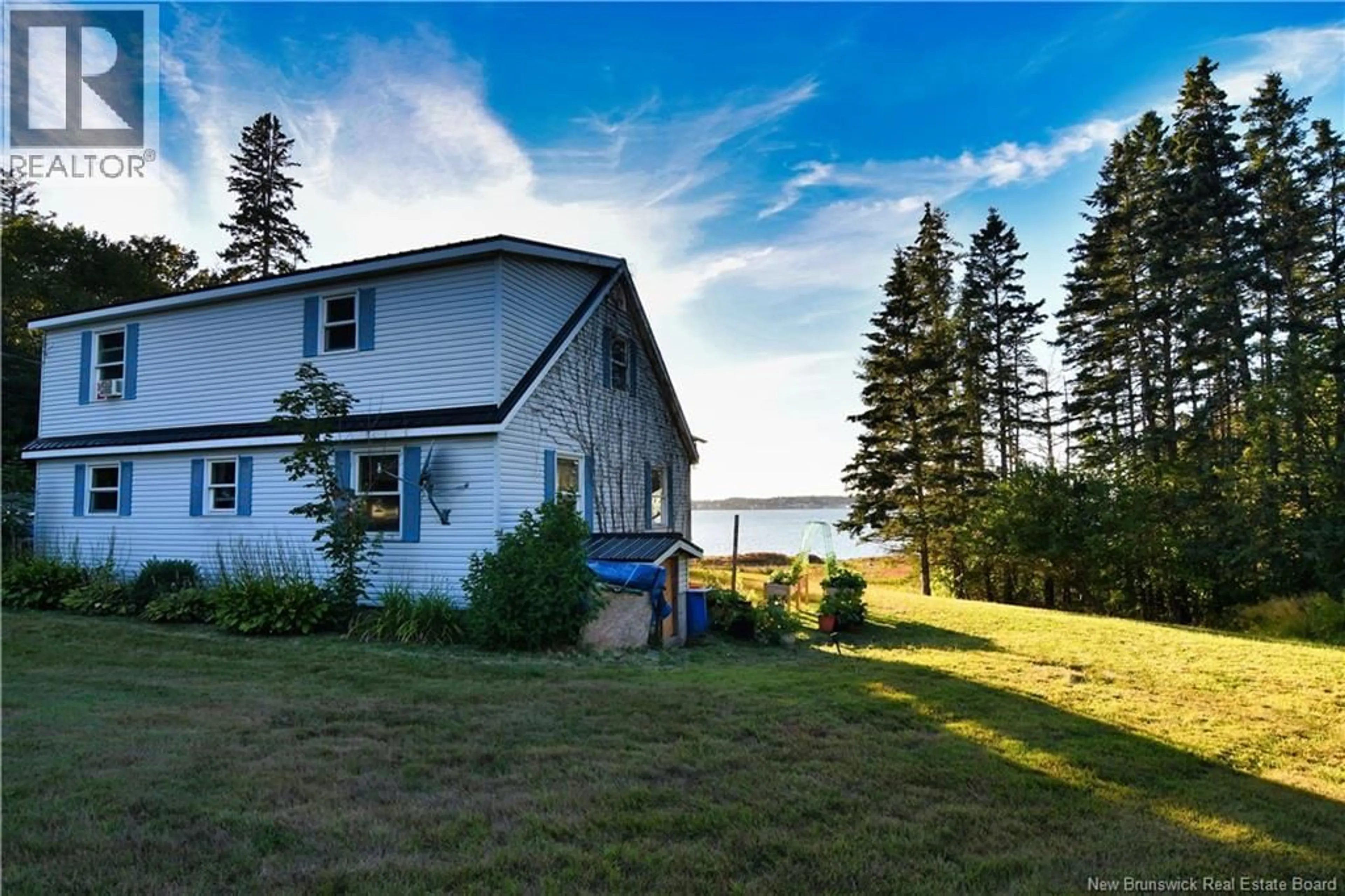 A pic from outside/outdoor area/front of a property/back of a property/a pic from drone, water/lake/river/ocean view for 175 NORTH ROAD, Welshpool New Brunswick E5E1C4