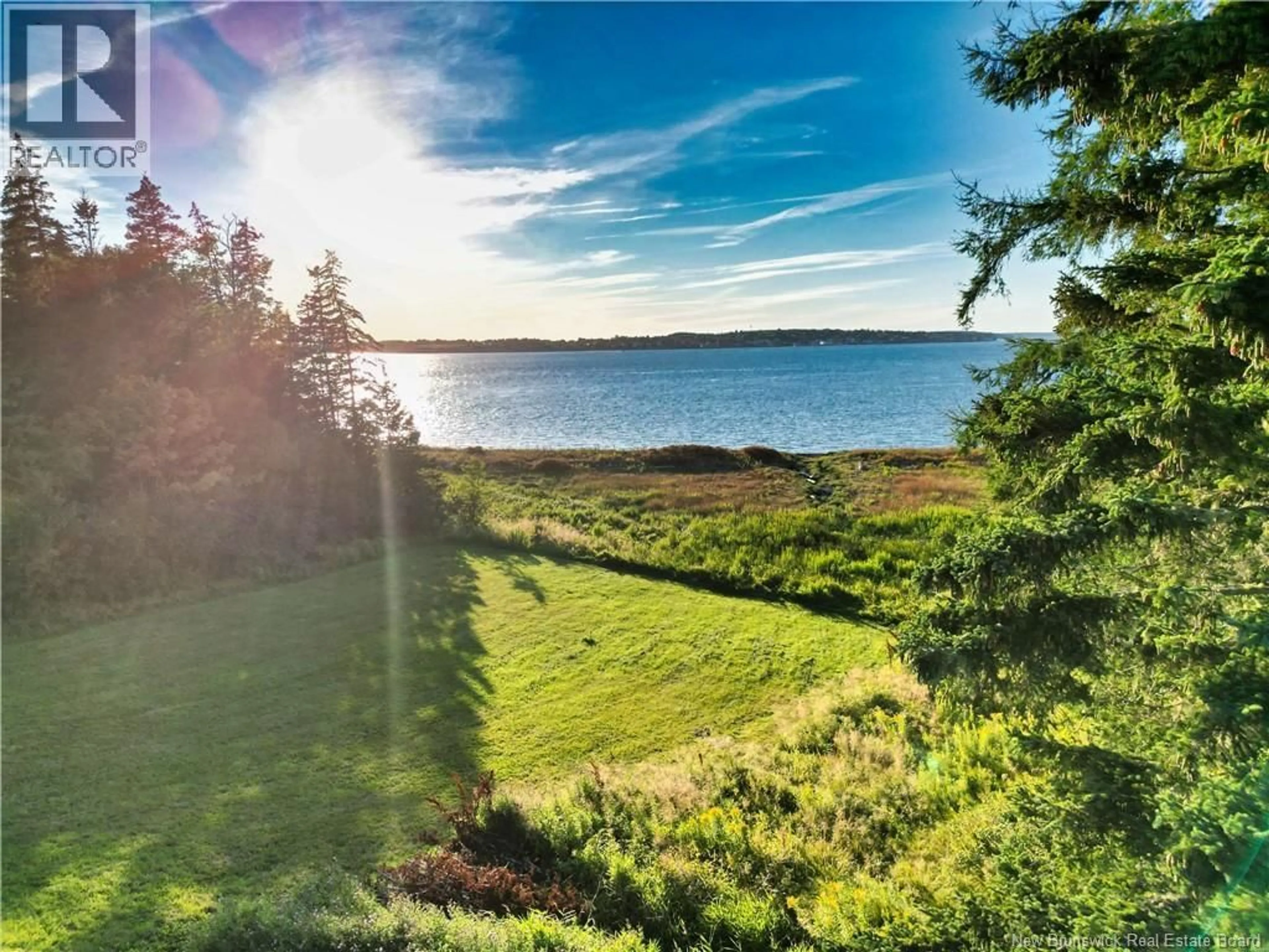 A pic from outside/outdoor area/front of a property/back of a property/a pic from drone, water/lake/river/ocean view for 175 NORTH ROAD, Welshpool New Brunswick E5E1C4