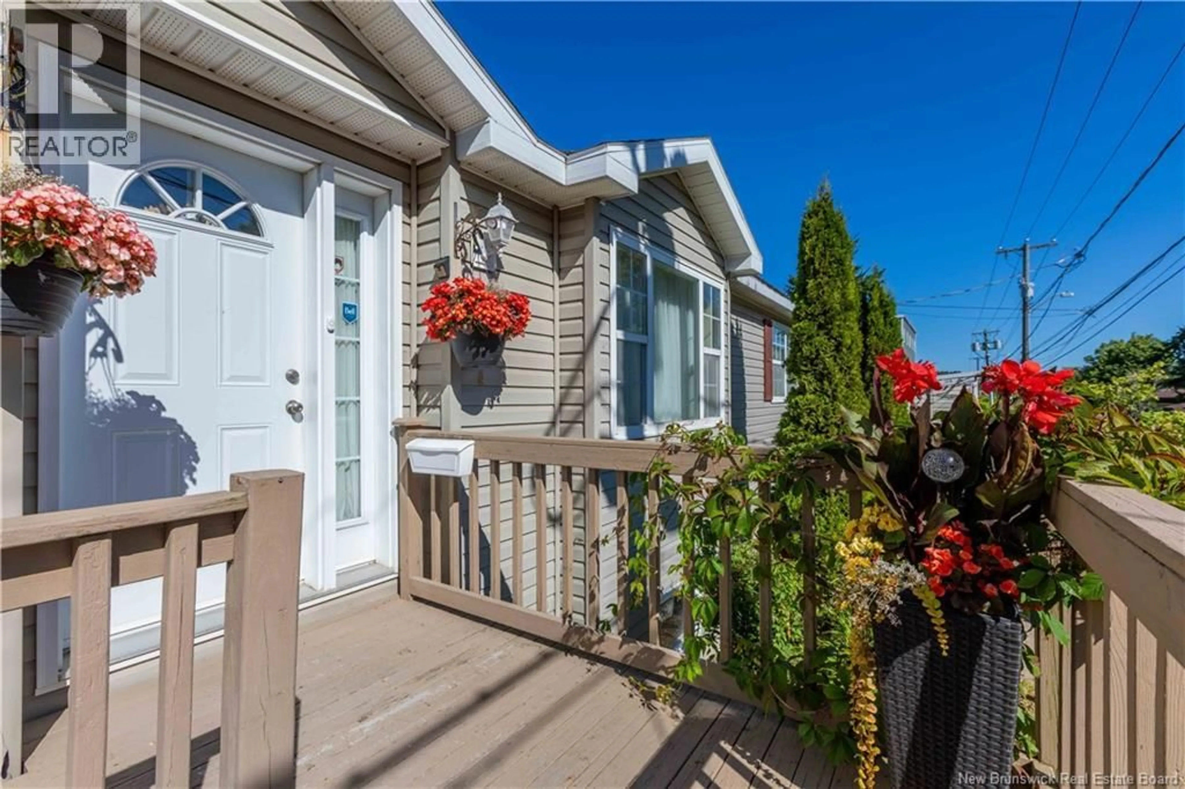 Home with vinyl exterior material, street for 677 BRUNSWICK DRIVE, Saint John New Brunswick E2L3T1