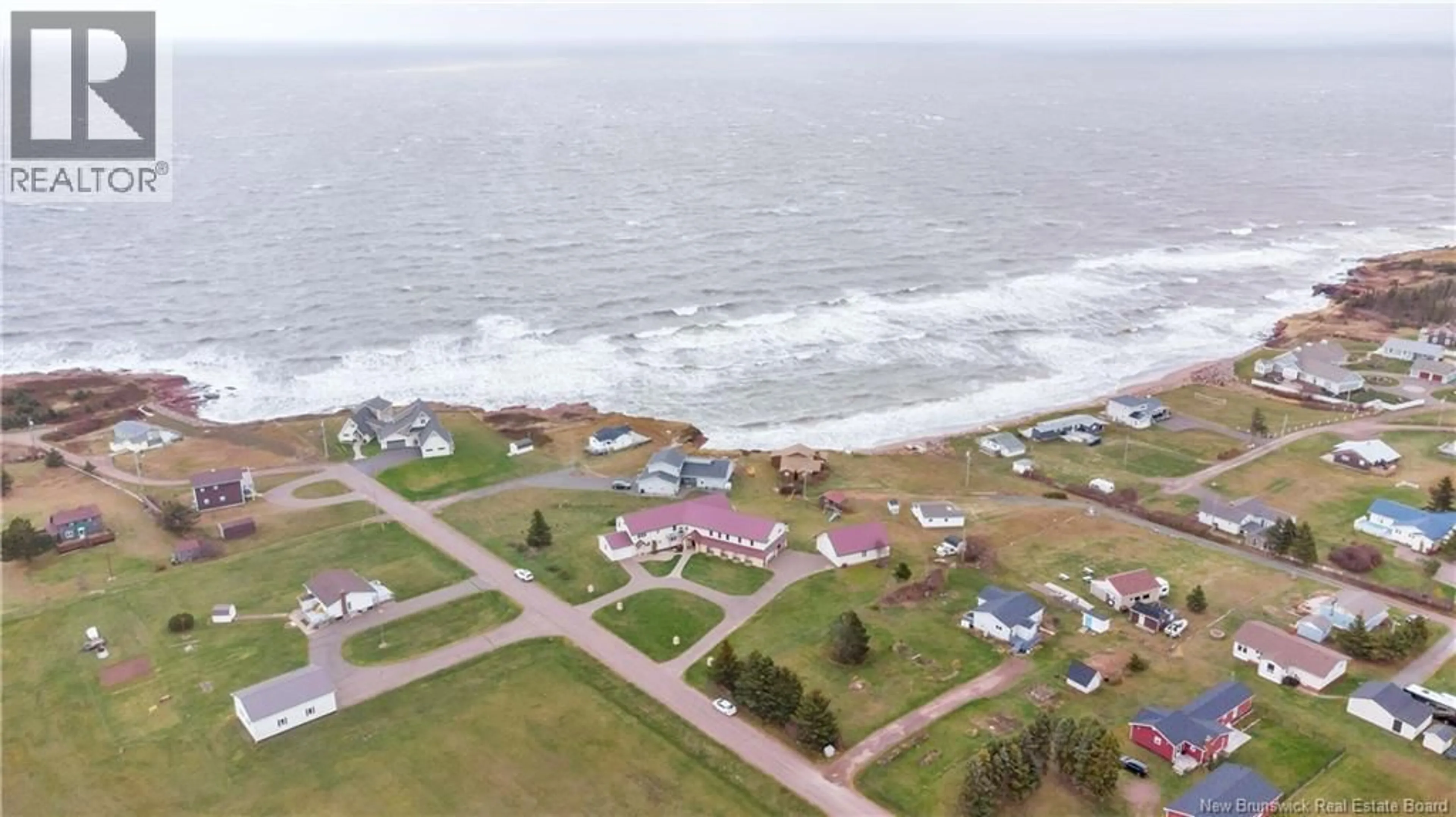 A pic from outside/outdoor area/front of a property/back of a property/a pic from drone, water/lake/river/ocean view for 51 VAUTOUR ROAD, Cap-Pelé New Brunswick E4N2C3