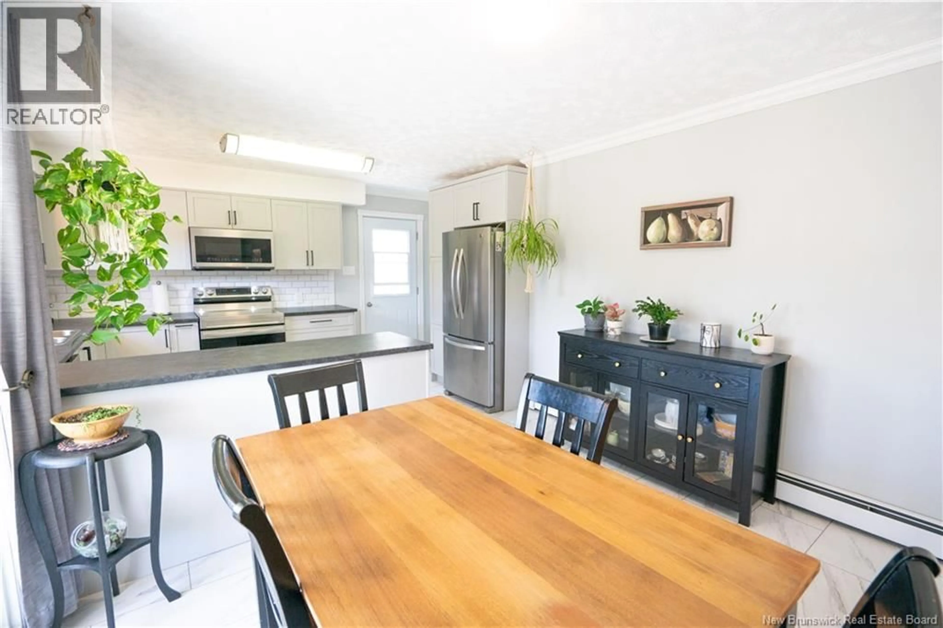 Open concept kitchen, wood/laminate floor for 13 RAINBOW CRESCENT, Grand Bay-Westfield New Brunswick E5K2T1