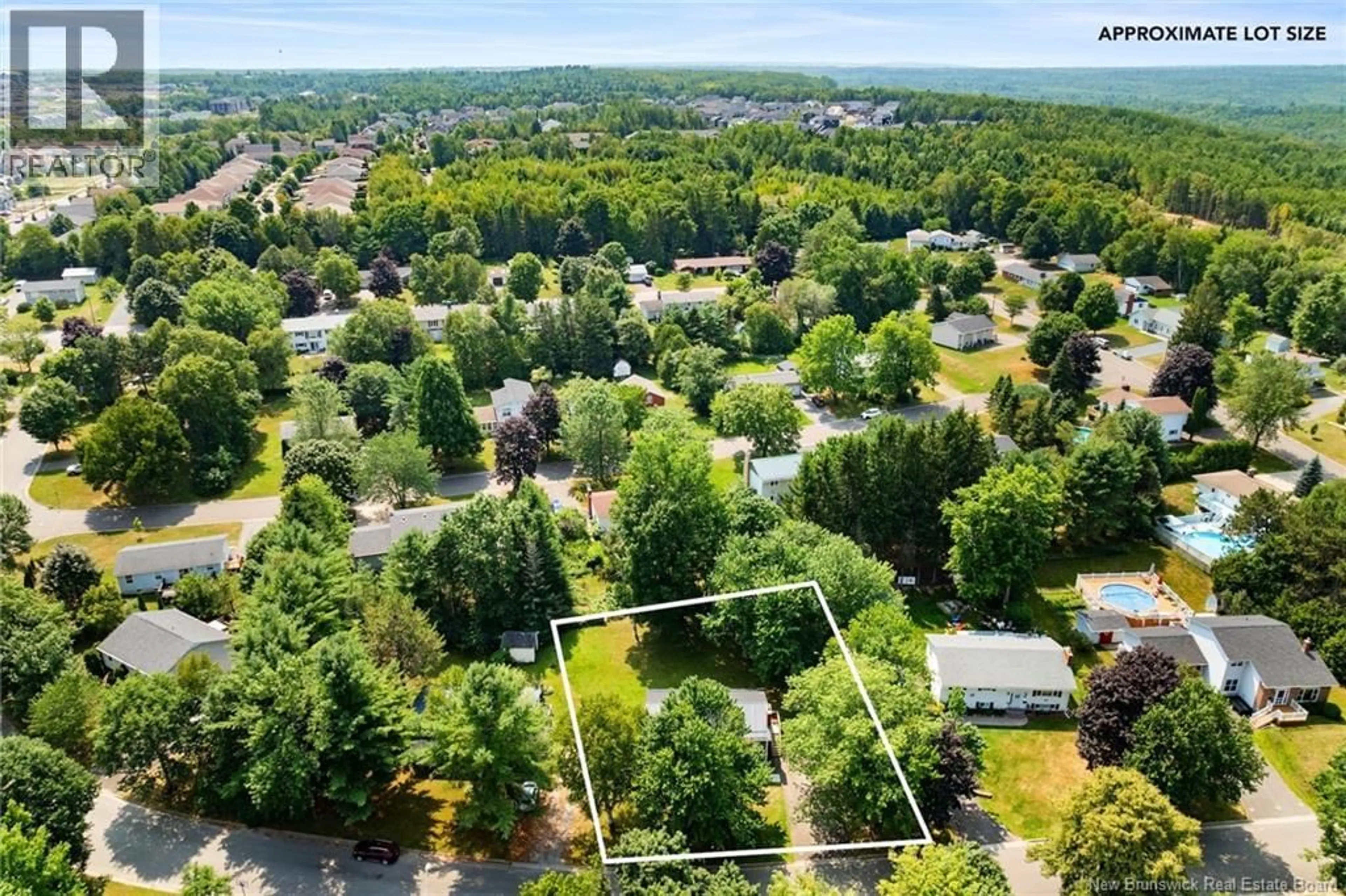 A pic from outside/outdoor area/front of a property/back of a property/a pic from drone, forest/trees view for 86 GARDEN STREET, Fredericton New Brunswick E3B7E1