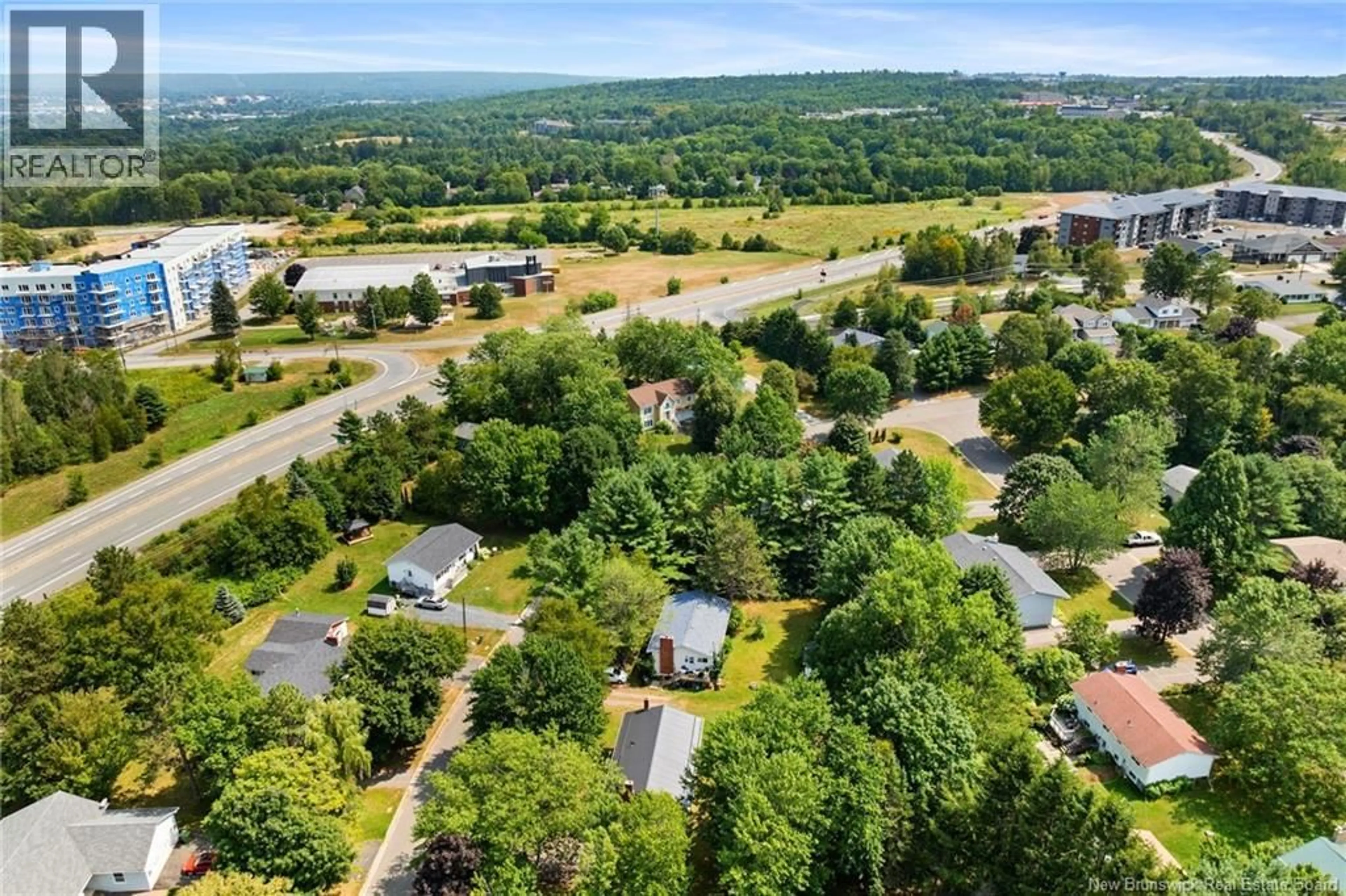A pic from outside/outdoor area/front of a property/back of a property/a pic from drone, unknown for 86 GARDEN STREET, Fredericton New Brunswick E3B7E1