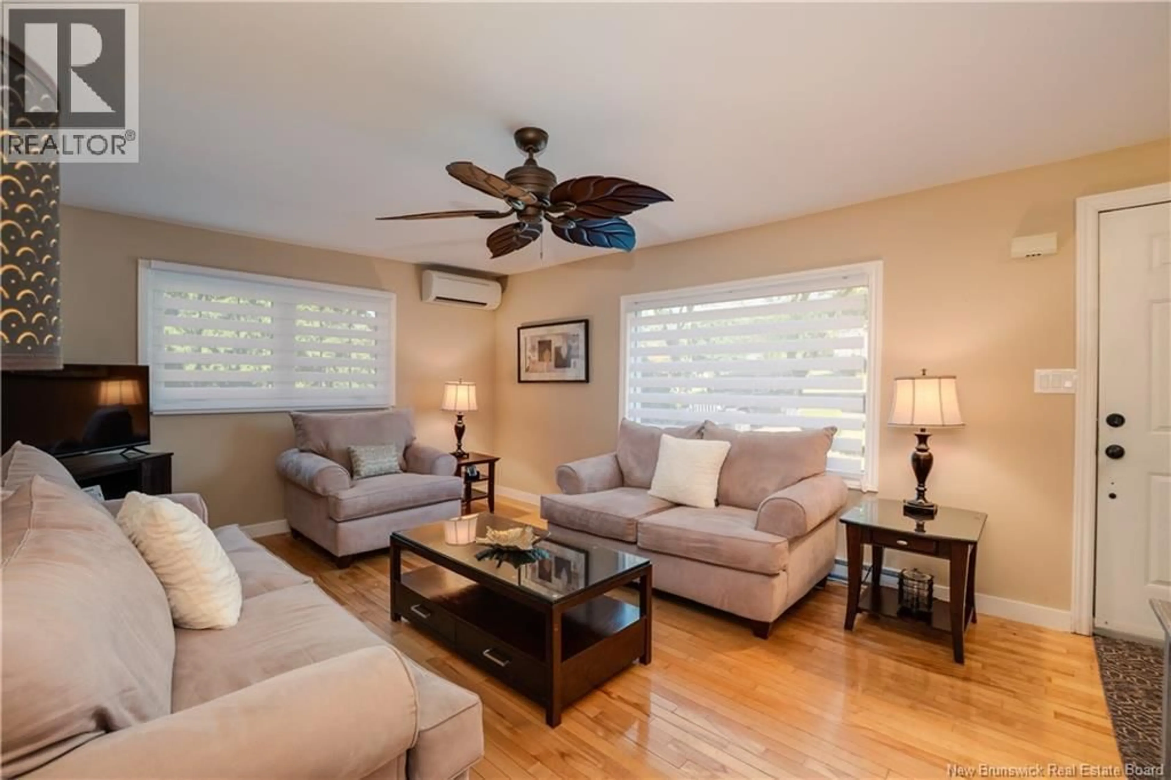 Living room with furniture, wood/laminate floor for 1224 SALISBURY ROAD, Moncton New Brunswick E1E3W1