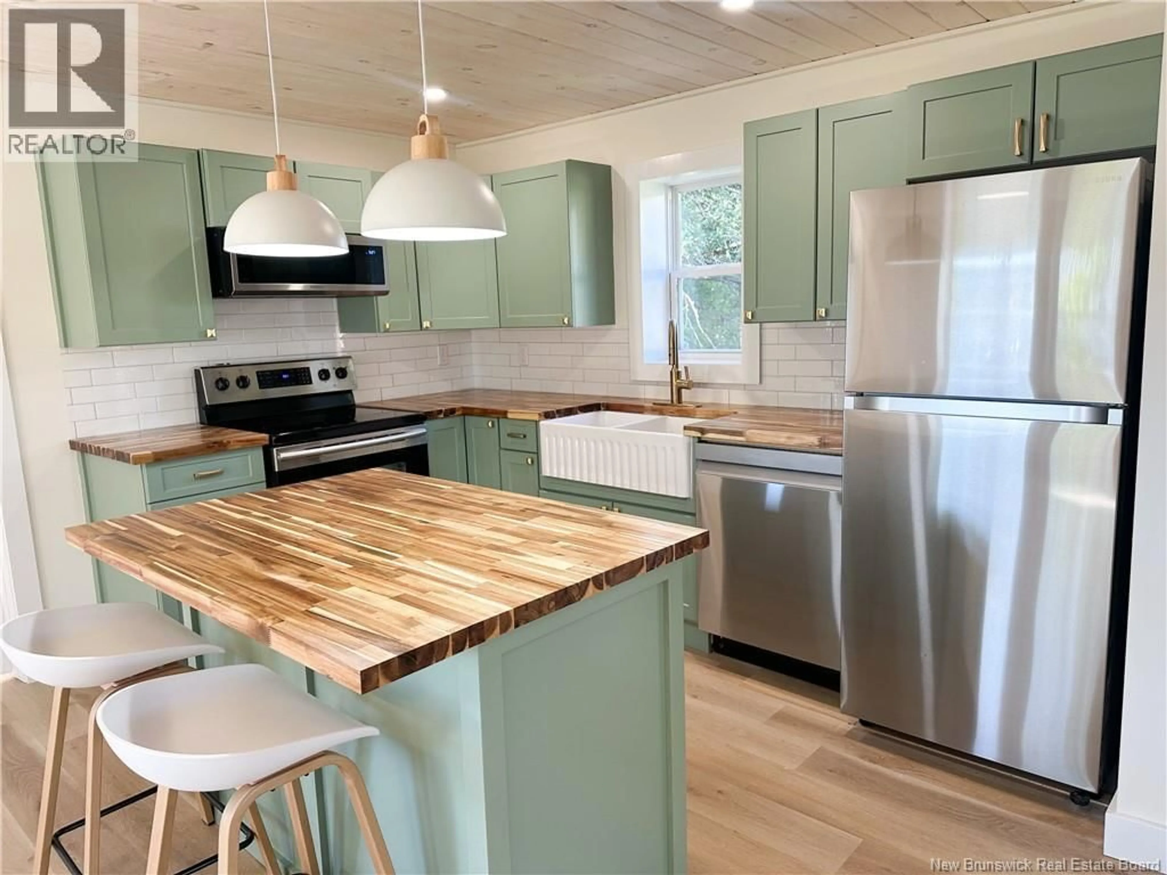Open concept kitchen, wood/laminate floor for 1950 ROUTE 121 ROUTE, Norton New Brunswick E5T1C5