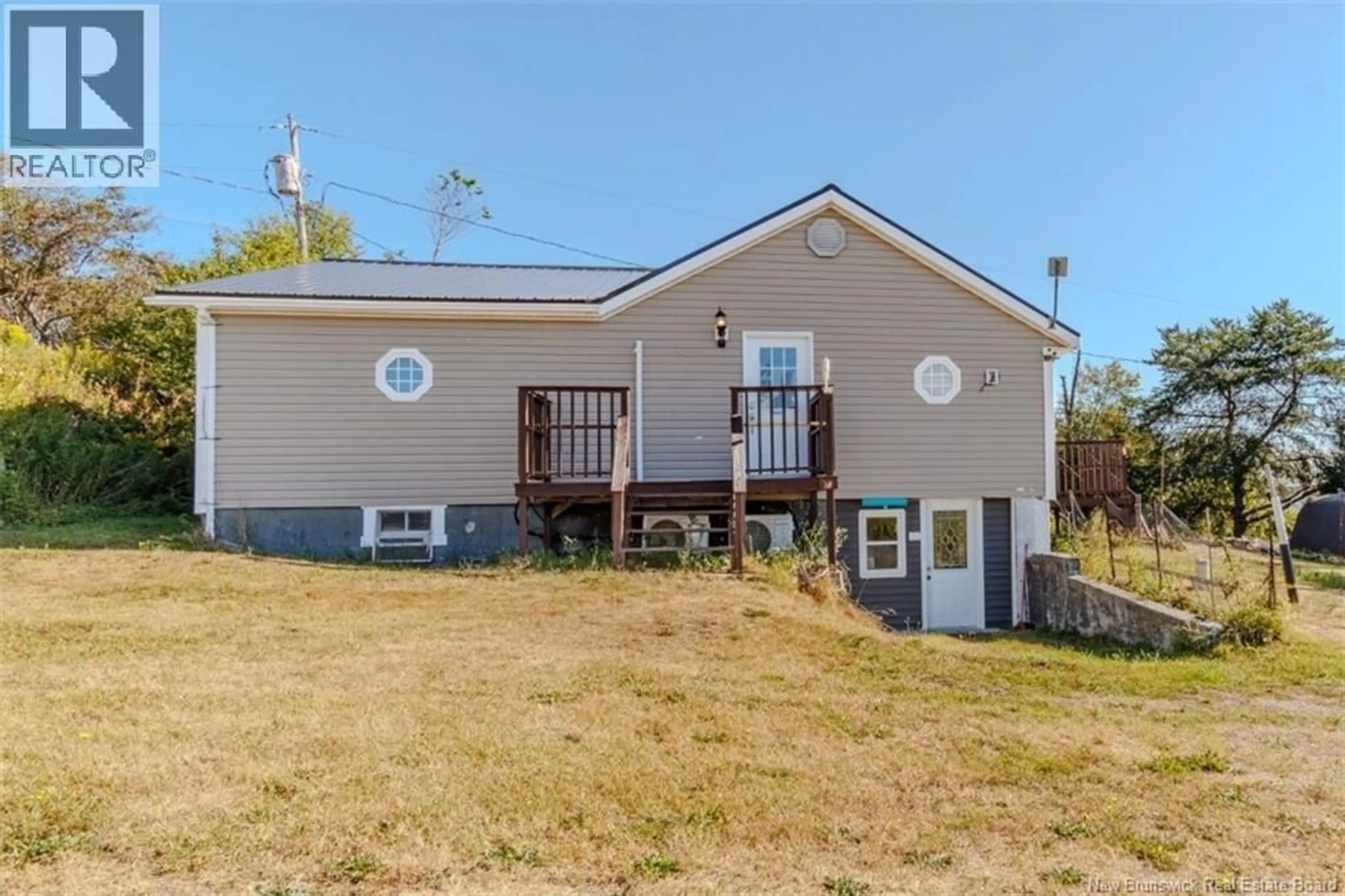 A pic from outside/outdoor area/front of a property/back of a property/a pic from drone, unknown for 10 BAYVIEW DRIVE, Back Bay New Brunswick E5C2X1