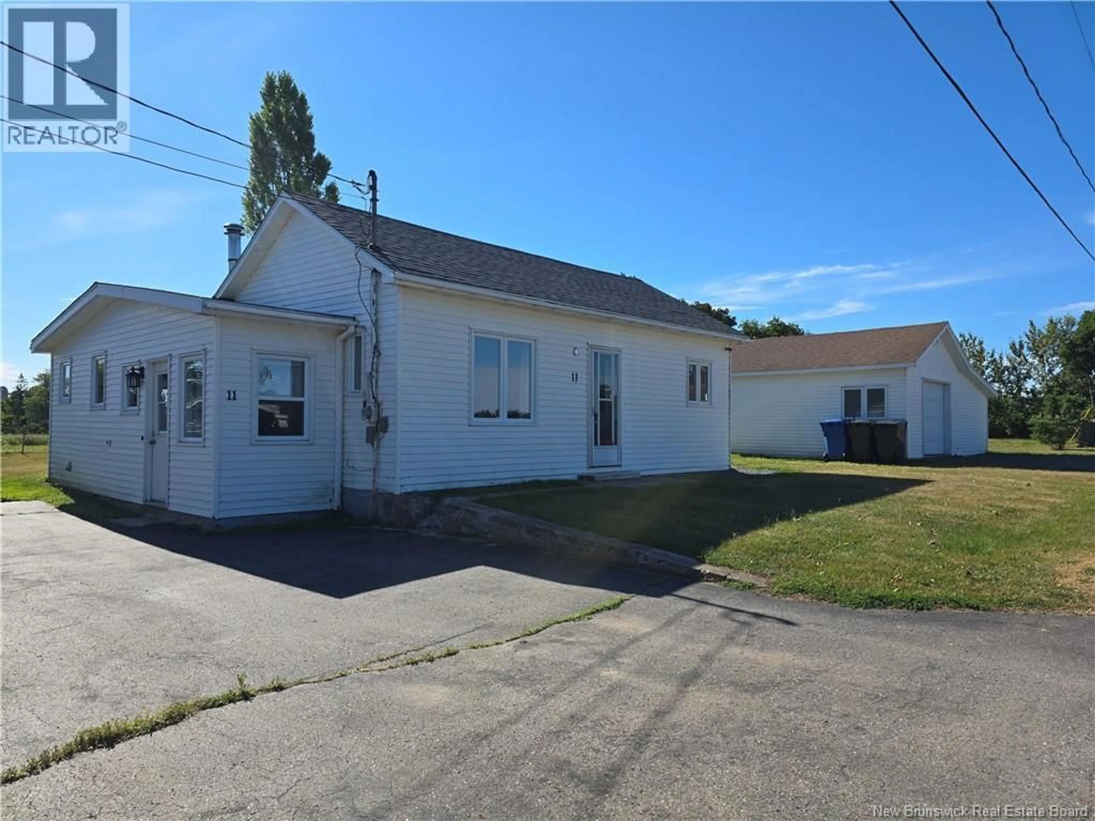 A pic from outside/outdoor area/front of a property/back of a property/a pic from drone, street for 11 VETERANS, Belledune New Brunswick E8G2X3