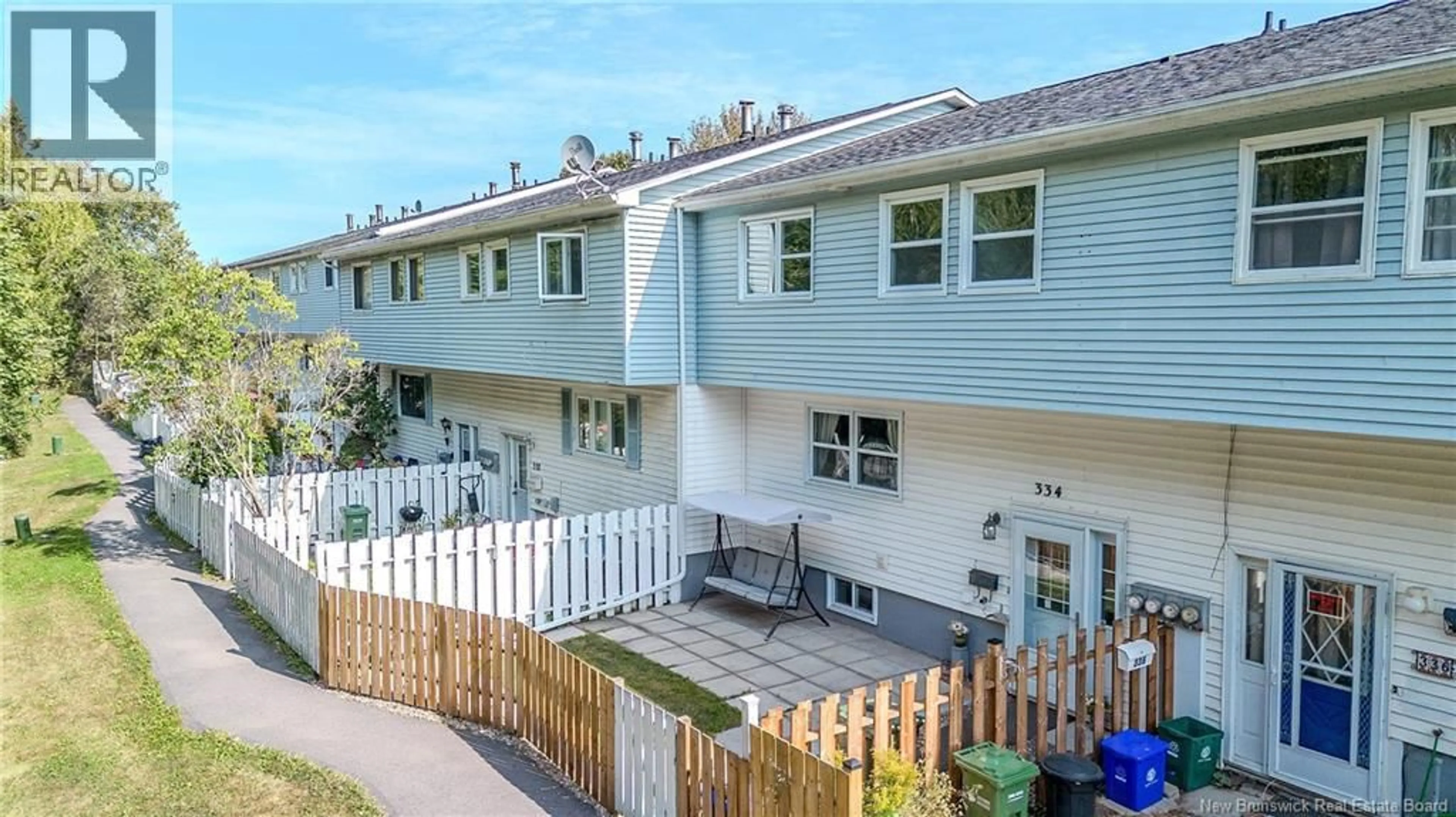 A pic from outside/outdoor area/front of a property/back of a property/a pic from drone, street for 334 TARTAN STREET, Saint John New Brunswick E2M0E2