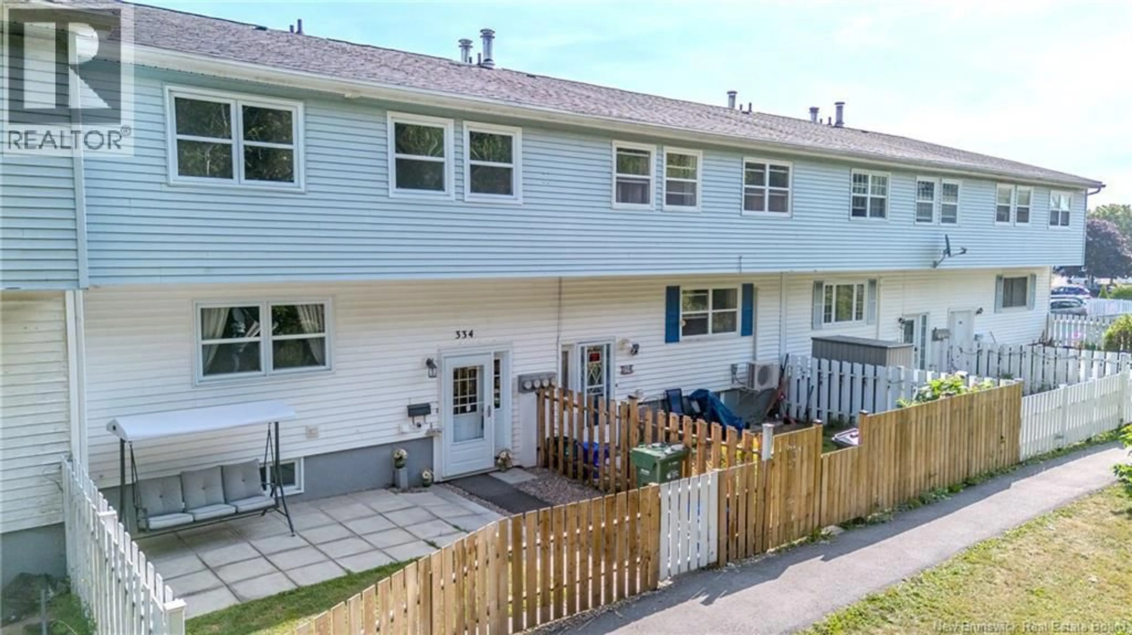 A pic from outside/outdoor area/front of a property/back of a property/a pic from drone, street for 334 TARTAN STREET, Saint John New Brunswick E2M0E2