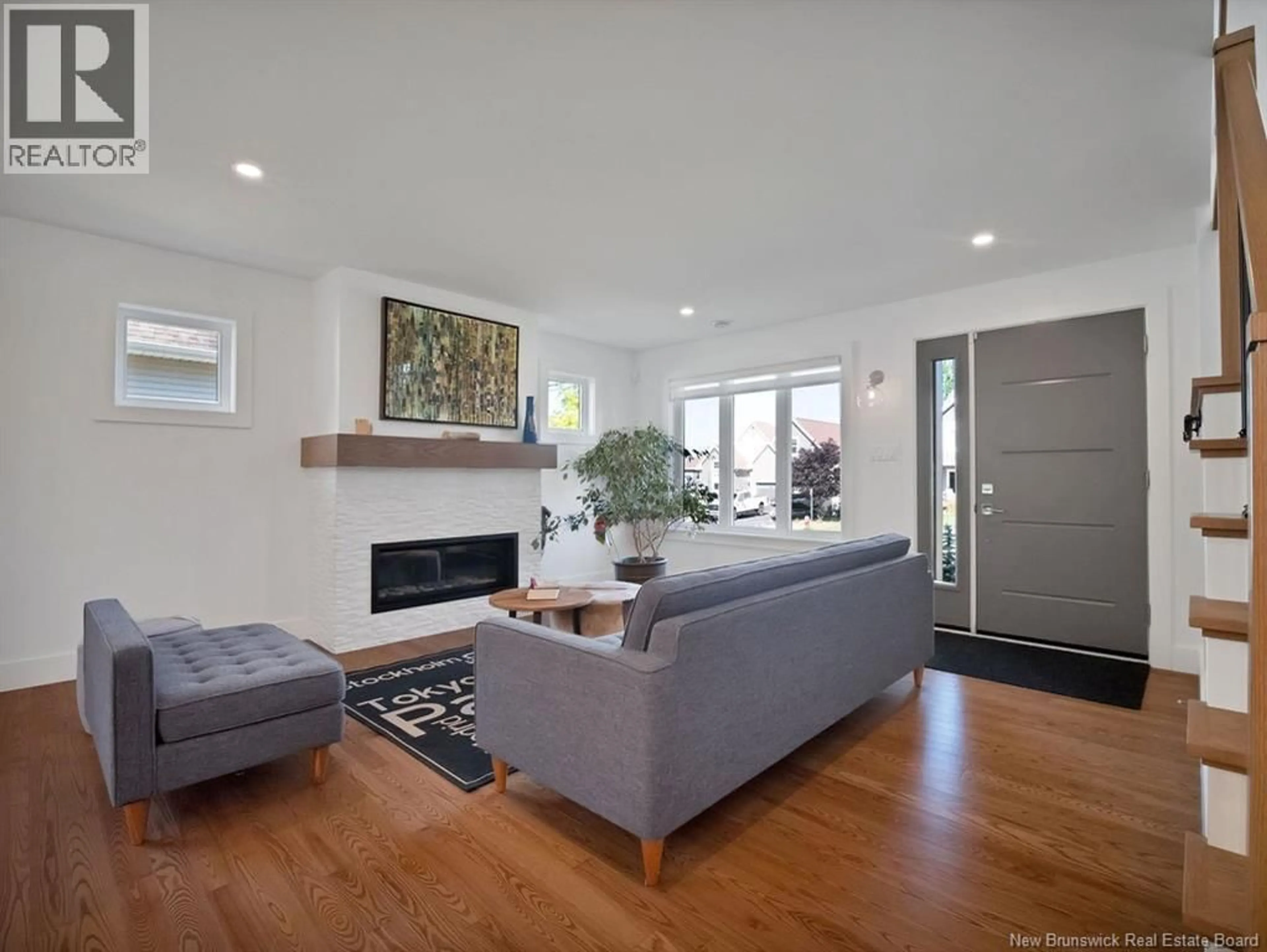 Living room with furniture, wood/laminate floor for 156 VALMONT CRESCENT, Dieppe New Brunswick E1A1N2
