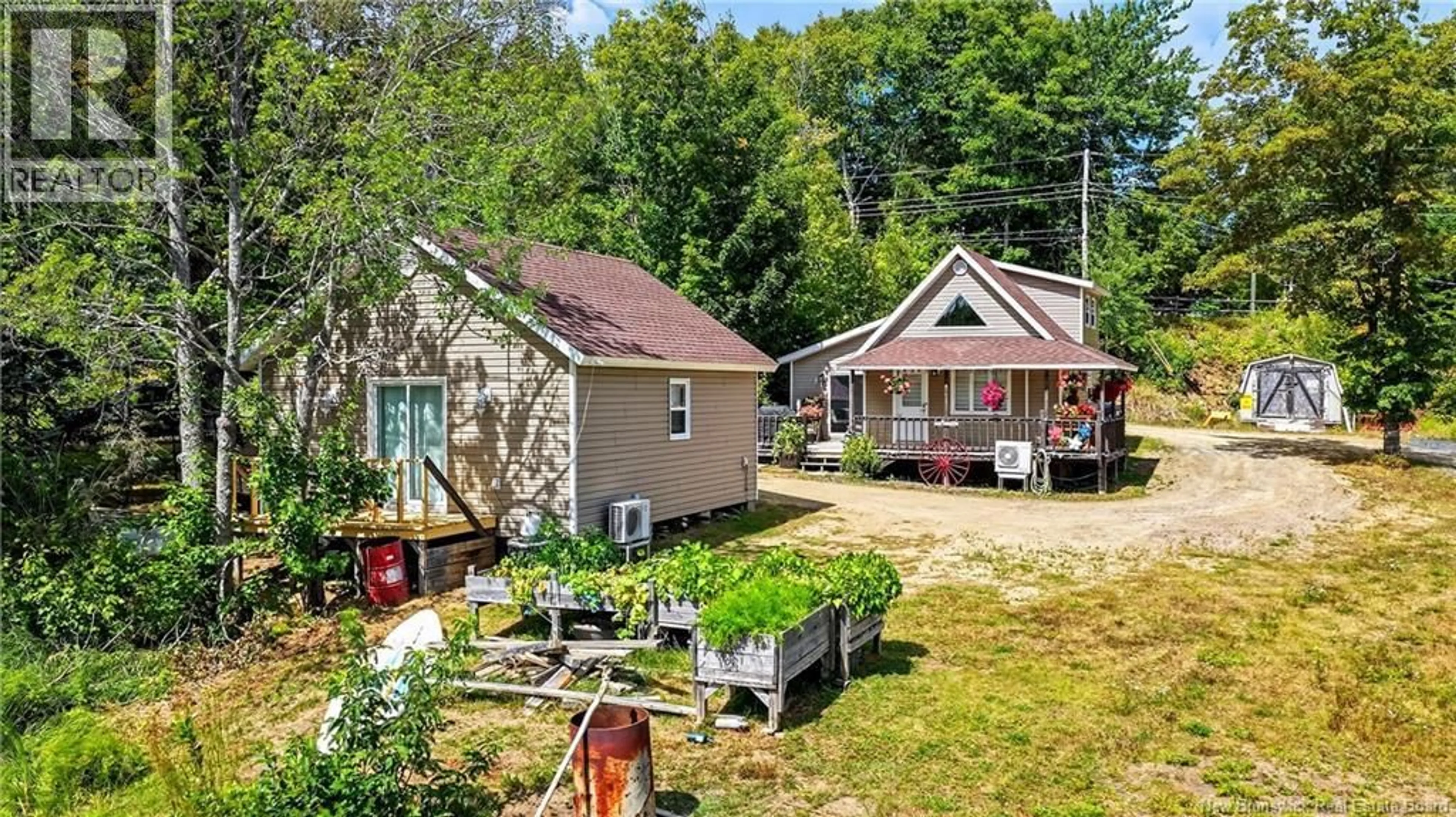 A pic from outside/outdoor area/front of a property/back of a property/a pic from drone, street for 126 ALLÉE LAC ADAM, Val-Doucet New Brunswick E8R1X4