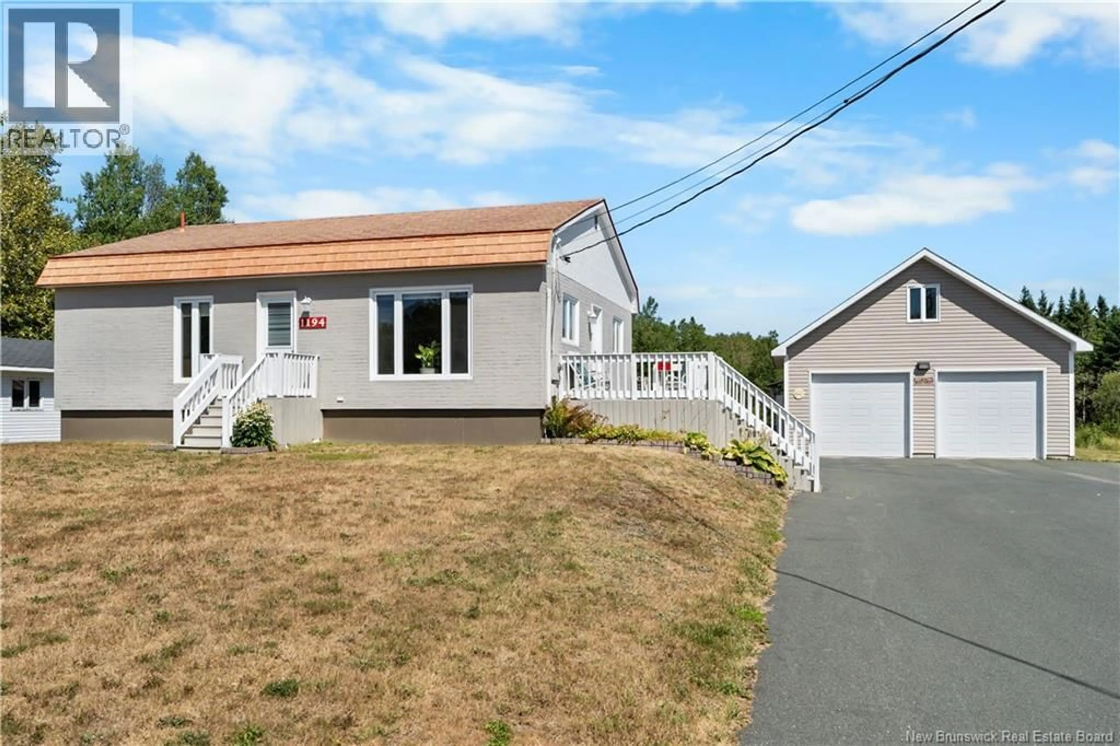 A pic from outside/outdoor area/front of a property/back of a property/a pic from drone, street for 1194 ROUTE 322, Robertville New Brunswick E8K2V4