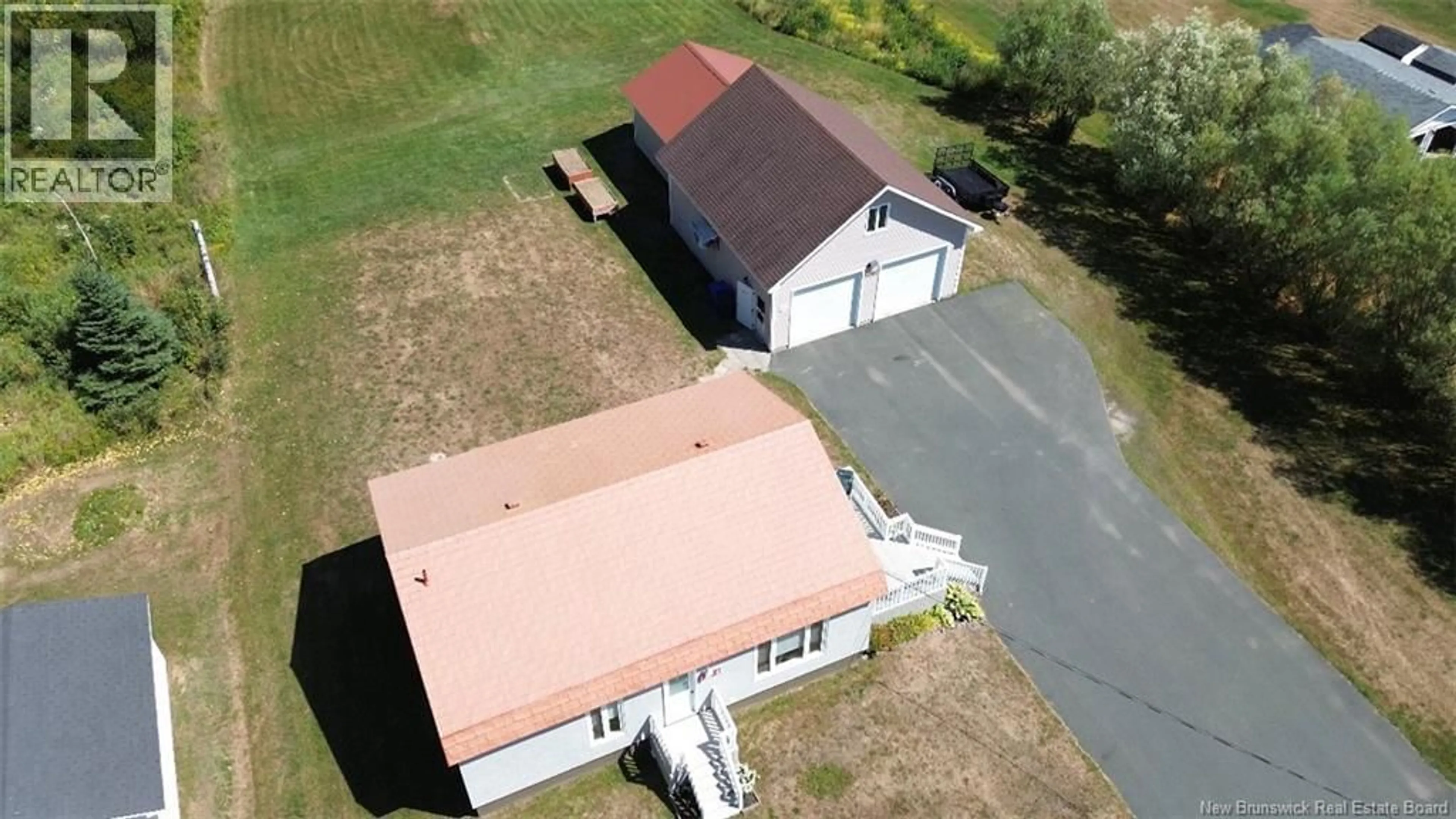 A pic from outside/outdoor area/front of a property/back of a property/a pic from drone, building for 1194 ROUTE 322, Robertville New Brunswick E8K2V4
