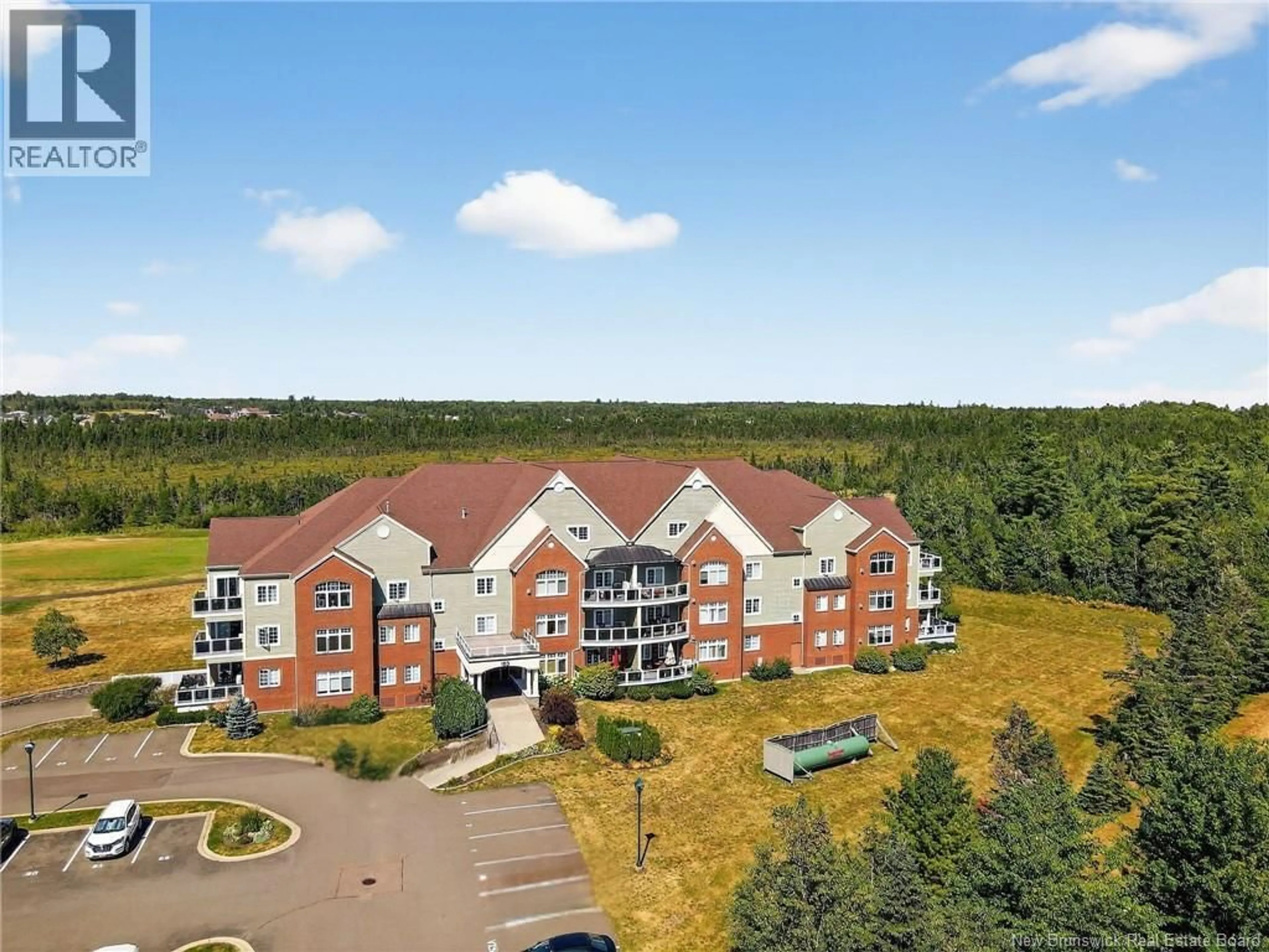 A pic from outside/outdoor area/front of a property/back of a property/a pic from drone, unknown for 163 ROYAL OAKS BOULEVARD, Moncton New Brunswick E1H2C7