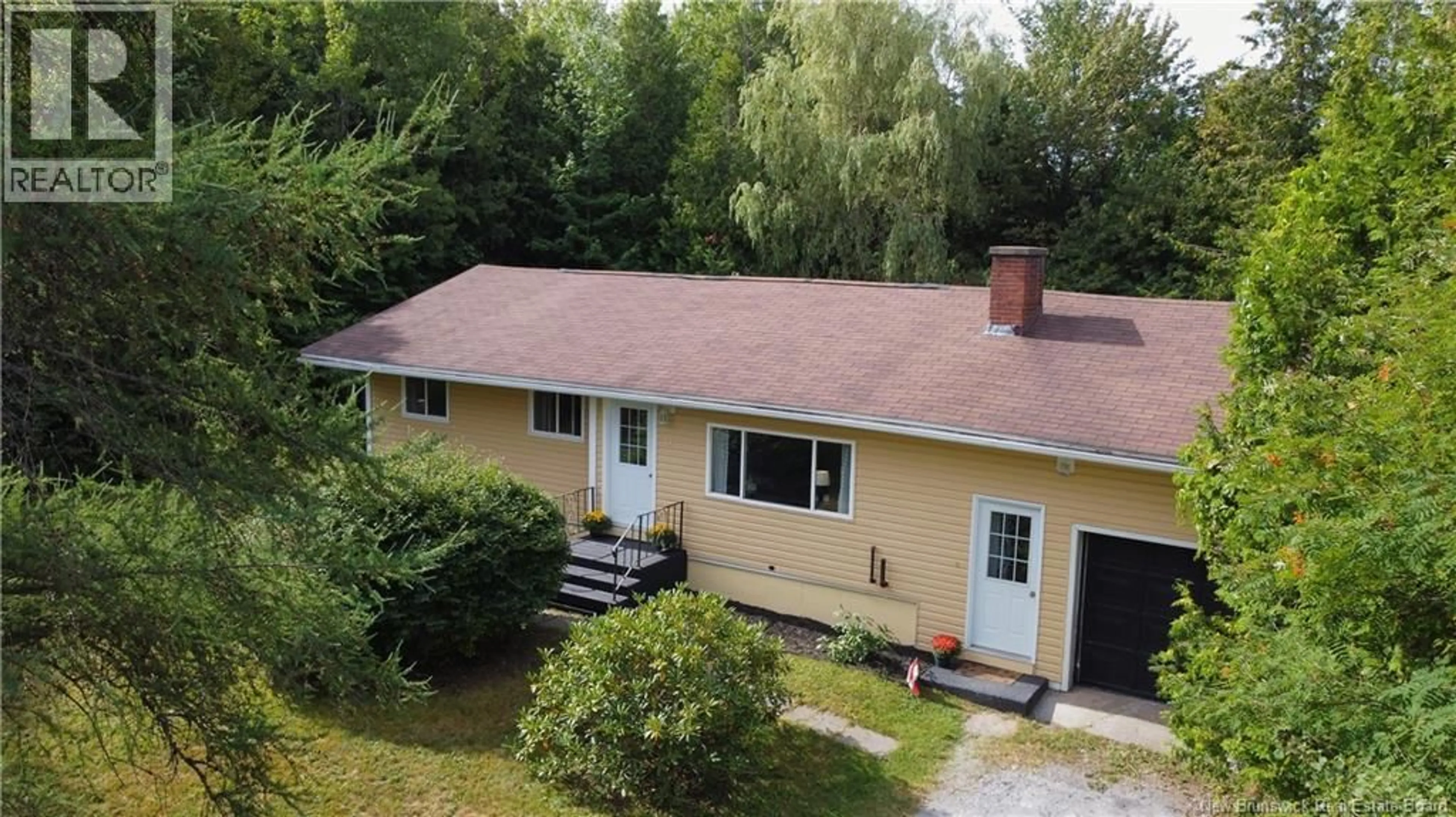 A pic from outside/outdoor area/front of a property/back of a property/a pic from drone, unknown for 15 HILLCREST DRIVE, Rothesay New Brunswick E2E5P7
