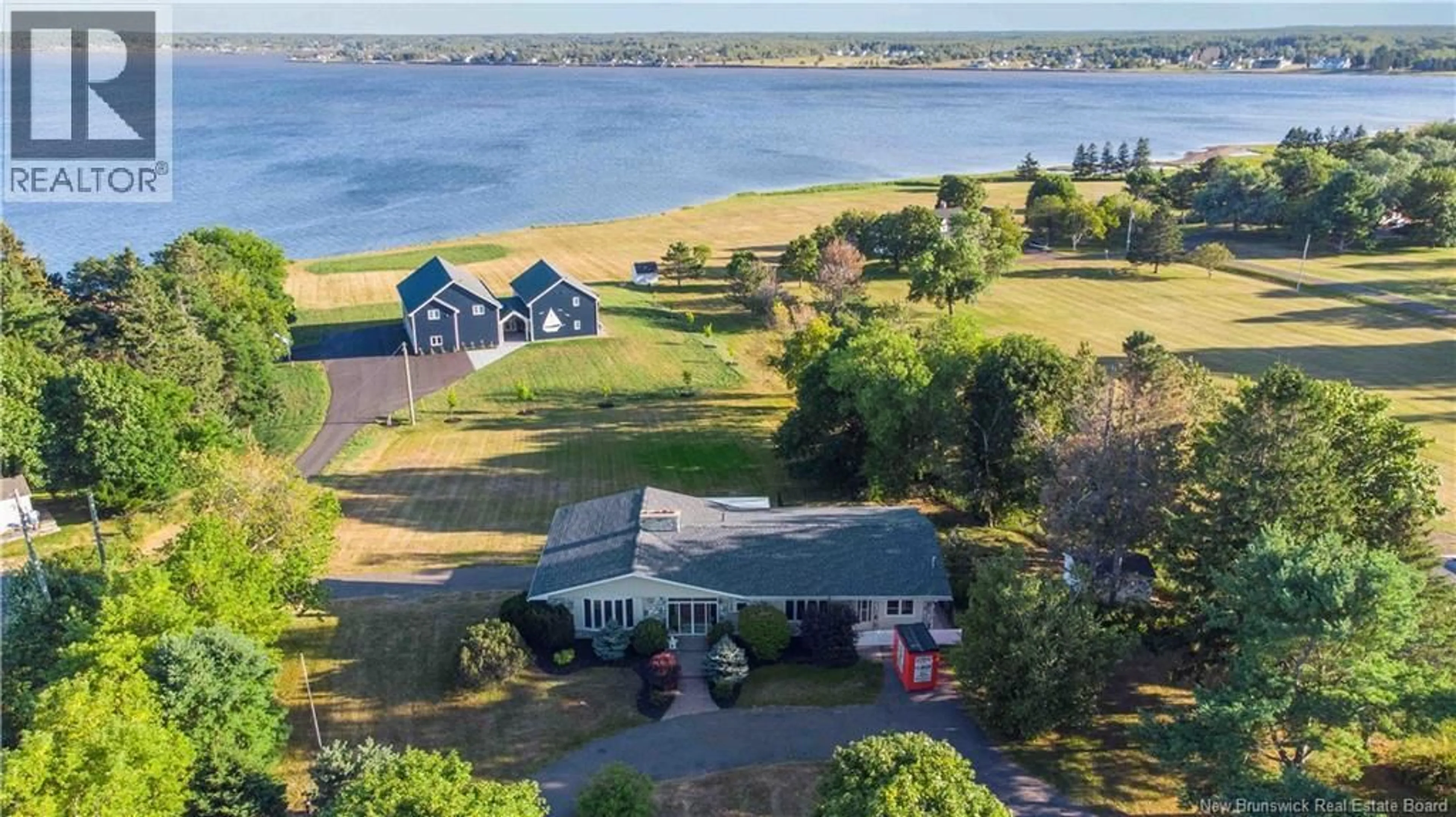 A pic from outside/outdoor area/front of a property/back of a property/a pic from drone, water/lake/river/ocean view for 153 DU COUVENT ROAD, Bouctouche New Brunswick E4S3B8