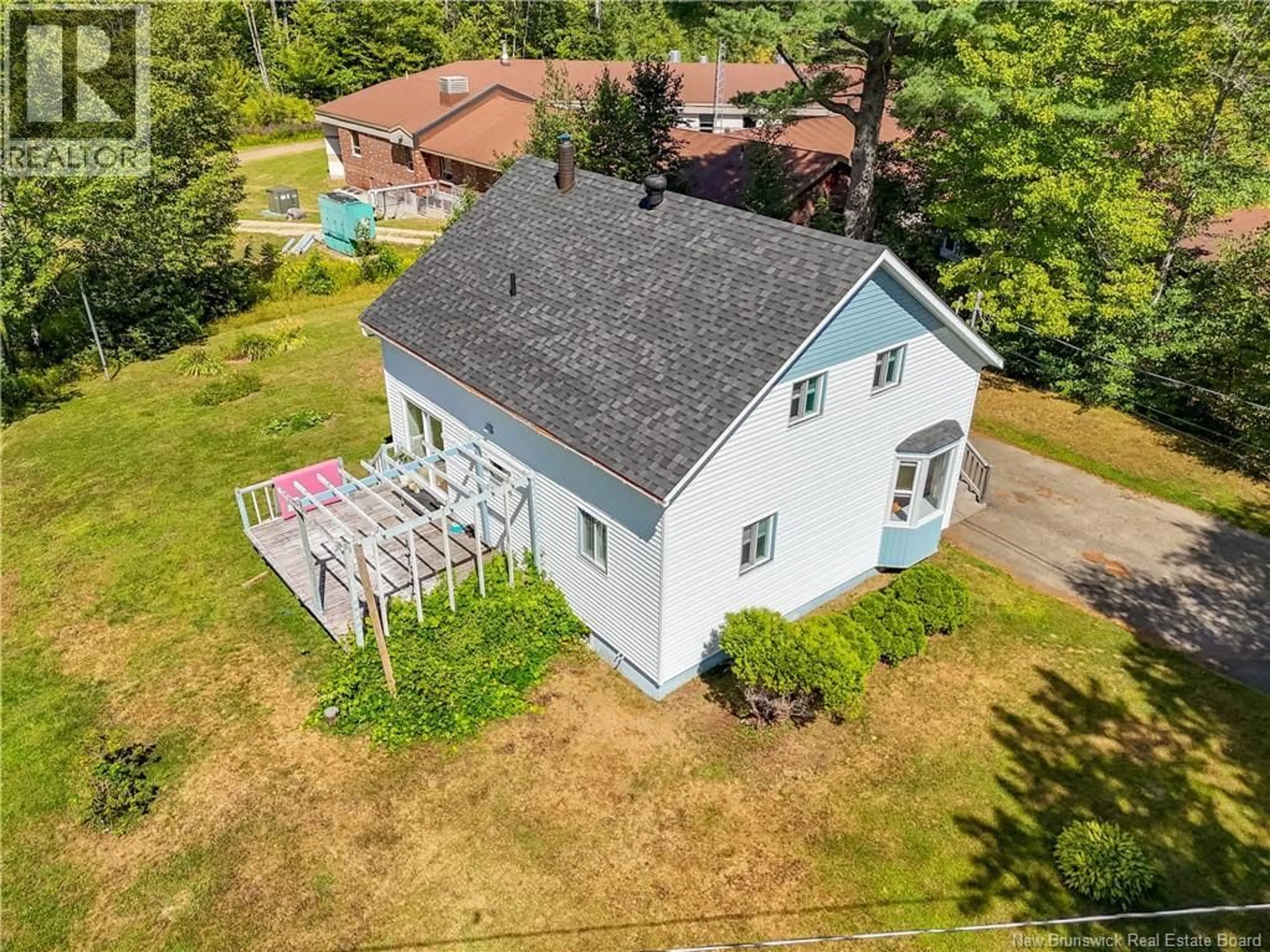 A pic from outside/outdoor area/front of a property/back of a property/a pic from drone, unknown for 9 SAUNDERS STREET, McAdam New Brunswick E6J1K9