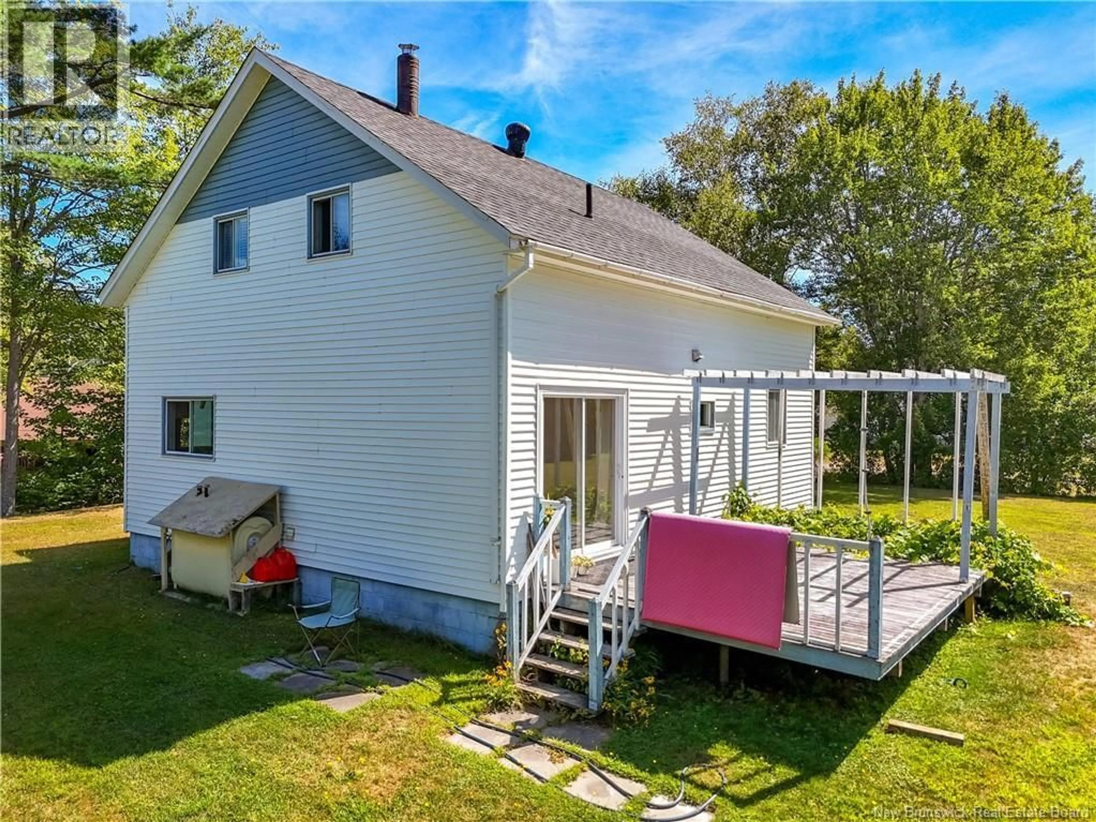 A pic from outside/outdoor area/front of a property/back of a property/a pic from drone, unknown for 9 SAUNDERS STREET, McAdam New Brunswick E6J1K9