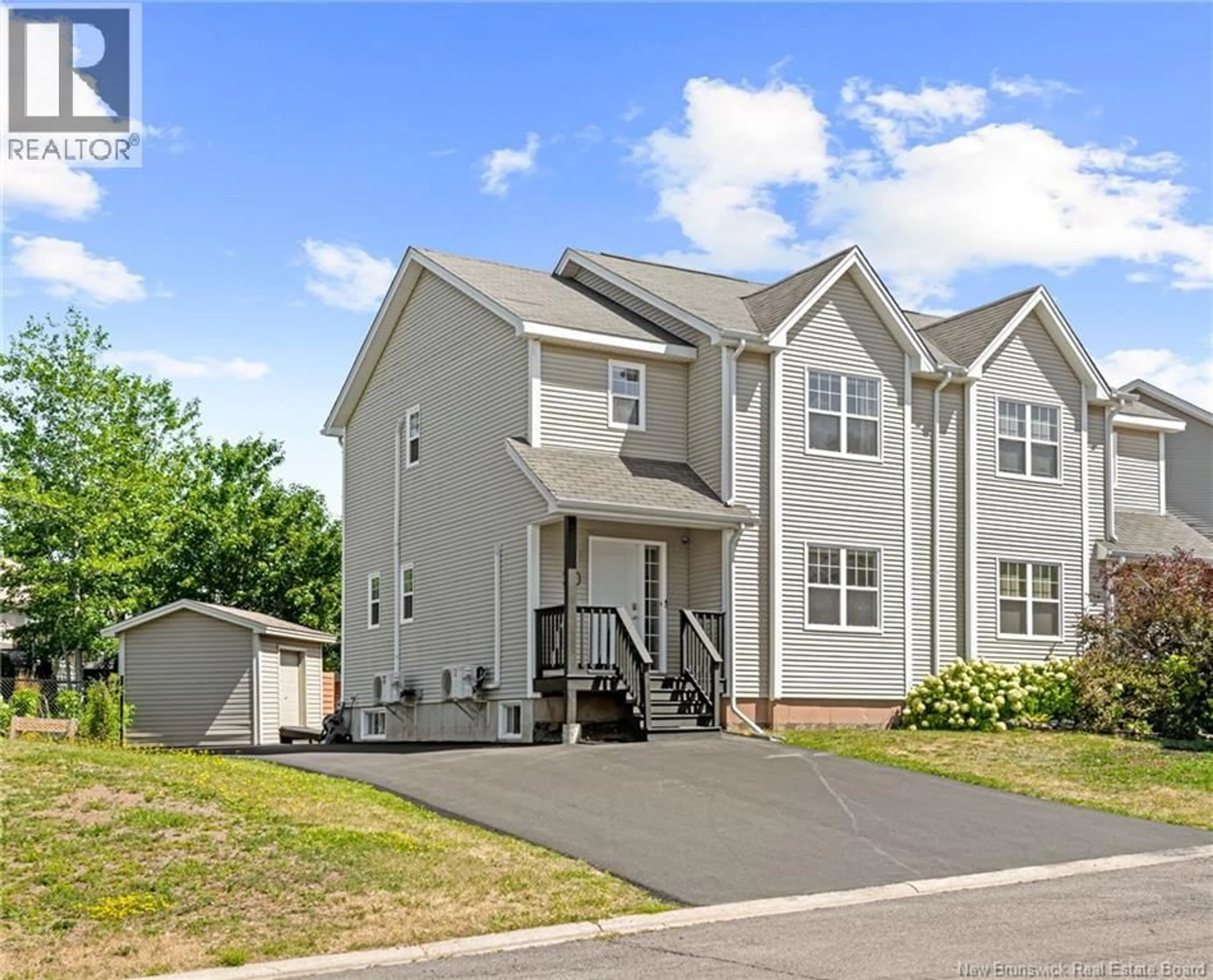 Home with vinyl exterior material, street for 20 DES FRENES, Dieppe New Brunswick E1A9B3