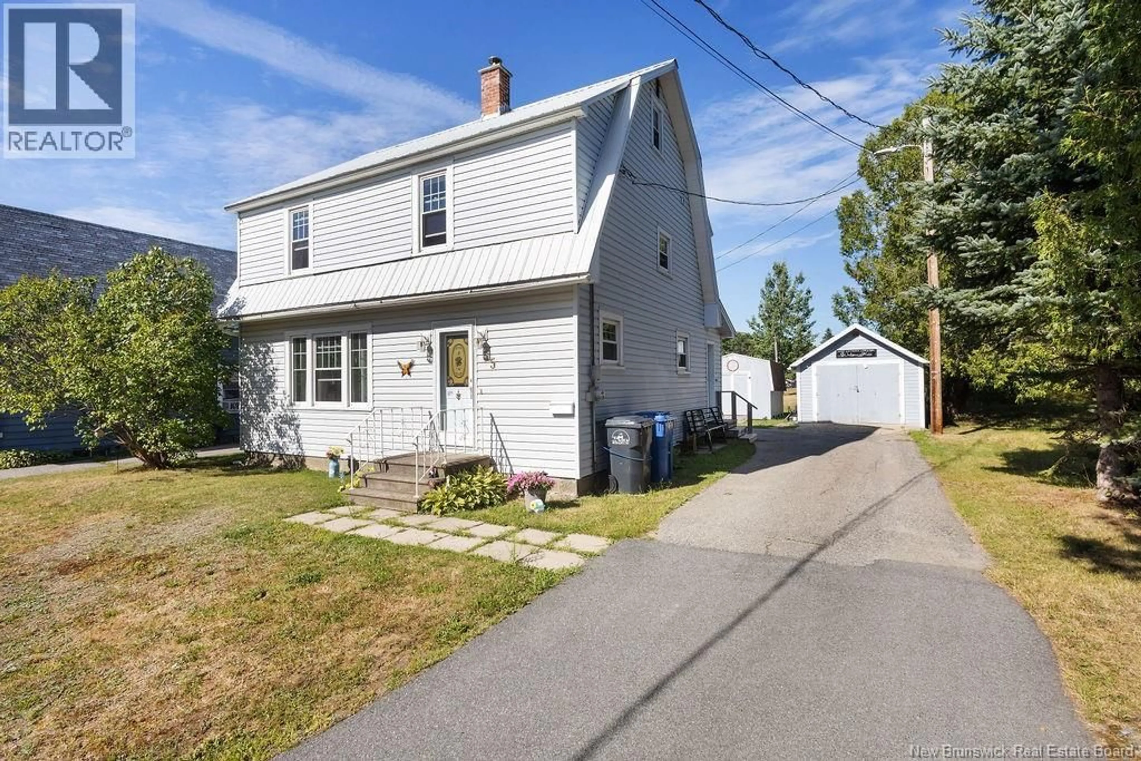 Home with vinyl exterior material, street for 55 QUEEN STREET, Miramichi New Brunswick E1N2M7