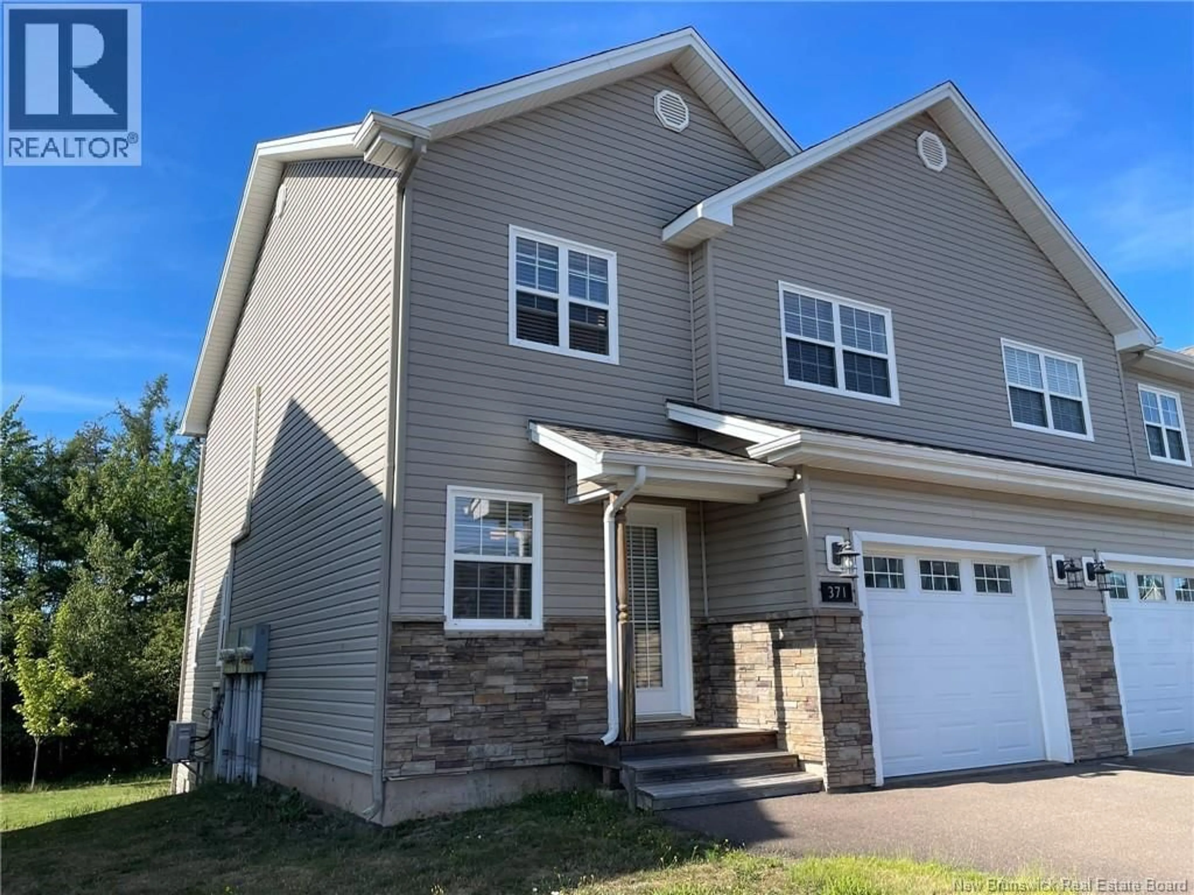 Home with vinyl exterior material, street for 371 DOLBEAU STREET, Dieppe New Brunswick E1A9P9