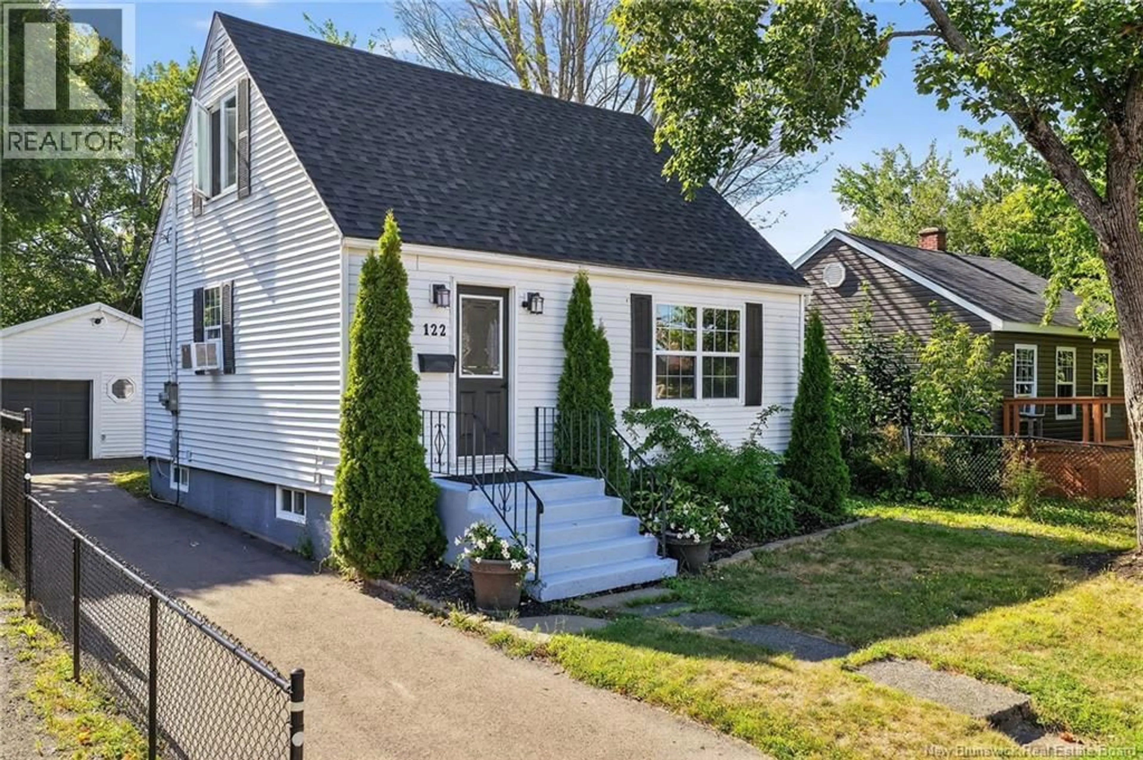 Home with vinyl exterior material, street for 122 JONES STREET, Moncton New Brunswick E1C6J6