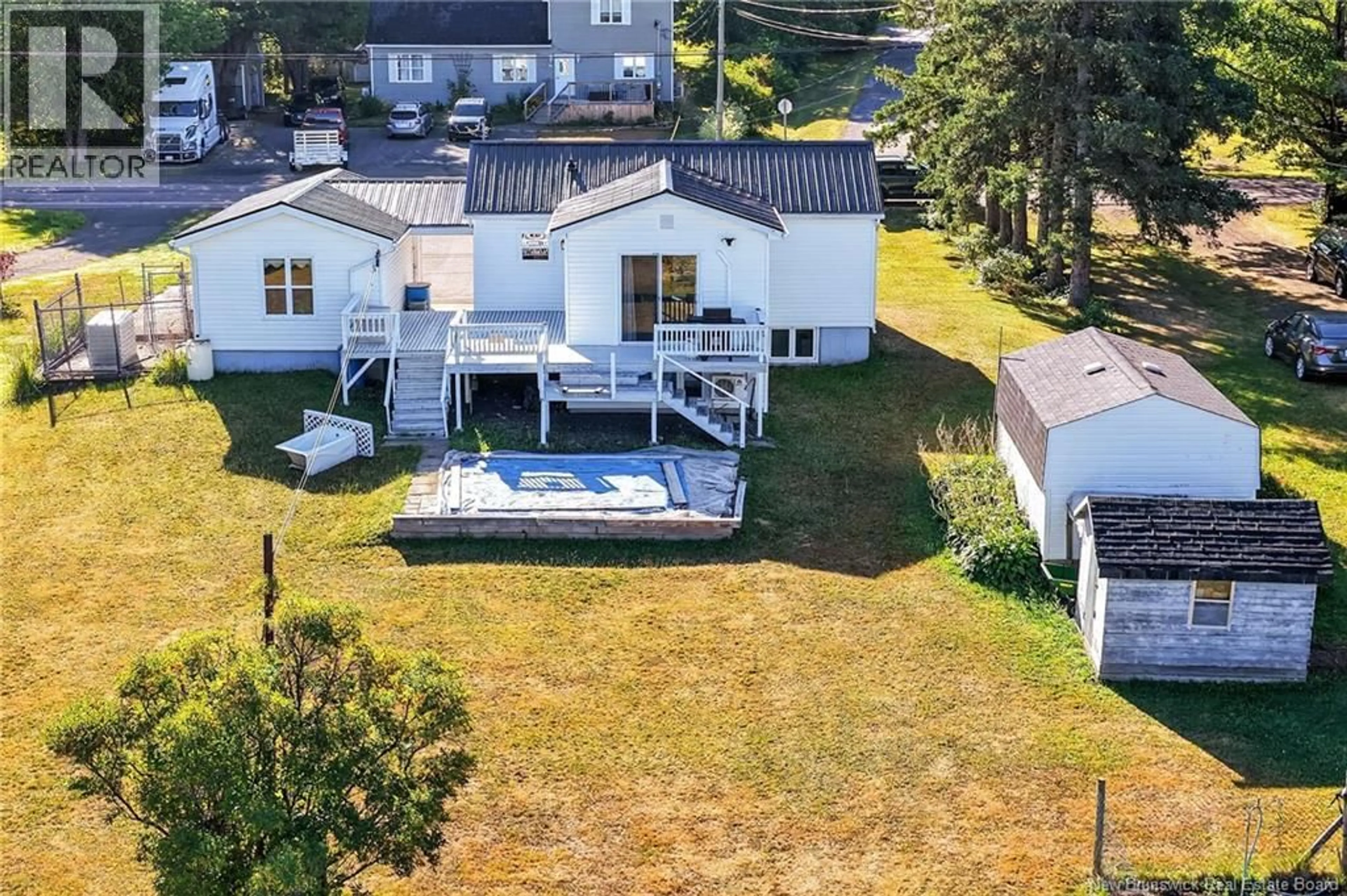 A pic from outside/outdoor area/front of a property/back of a property/a pic from drone, water/lake/river/ocean view for 67 RENFREW STREET, Petitcodiac New Brunswick E4Z4S5