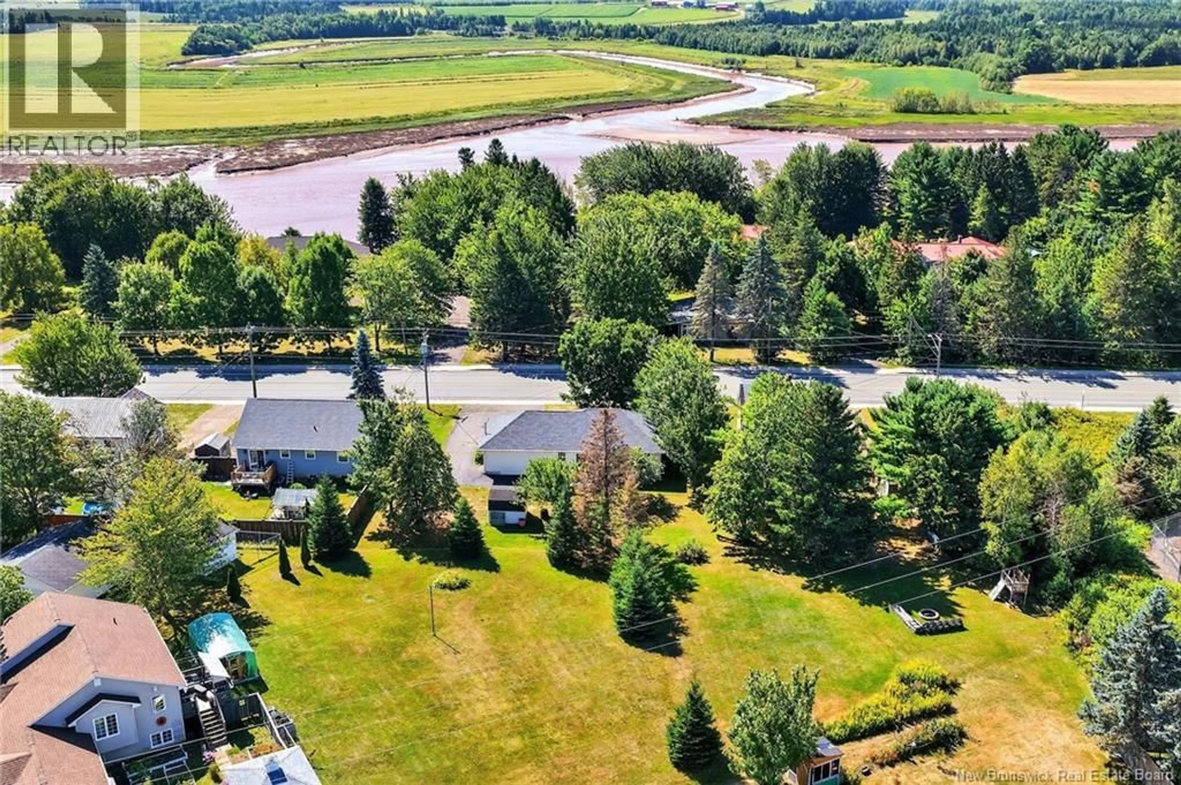 A pic from outside/outdoor area/front of a property/back of a property/a pic from drone, water/lake/river/ocean view for 1421 SALISBURY ROAD, Moncton New Brunswick E1E4P8