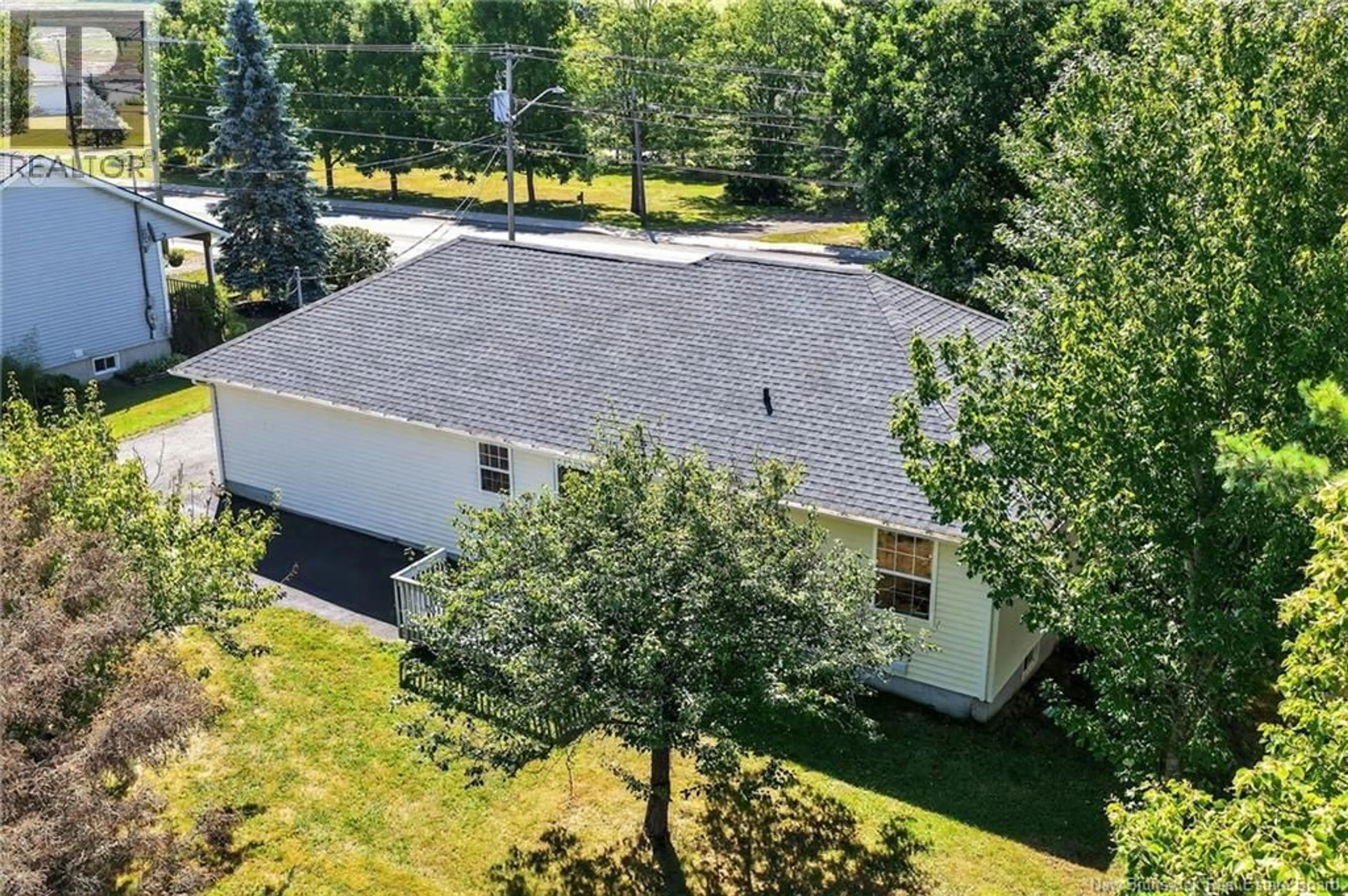 A pic from outside/outdoor area/front of a property/back of a property/a pic from drone, unknown for 1421 SALISBURY ROAD, Moncton New Brunswick E1E4P8