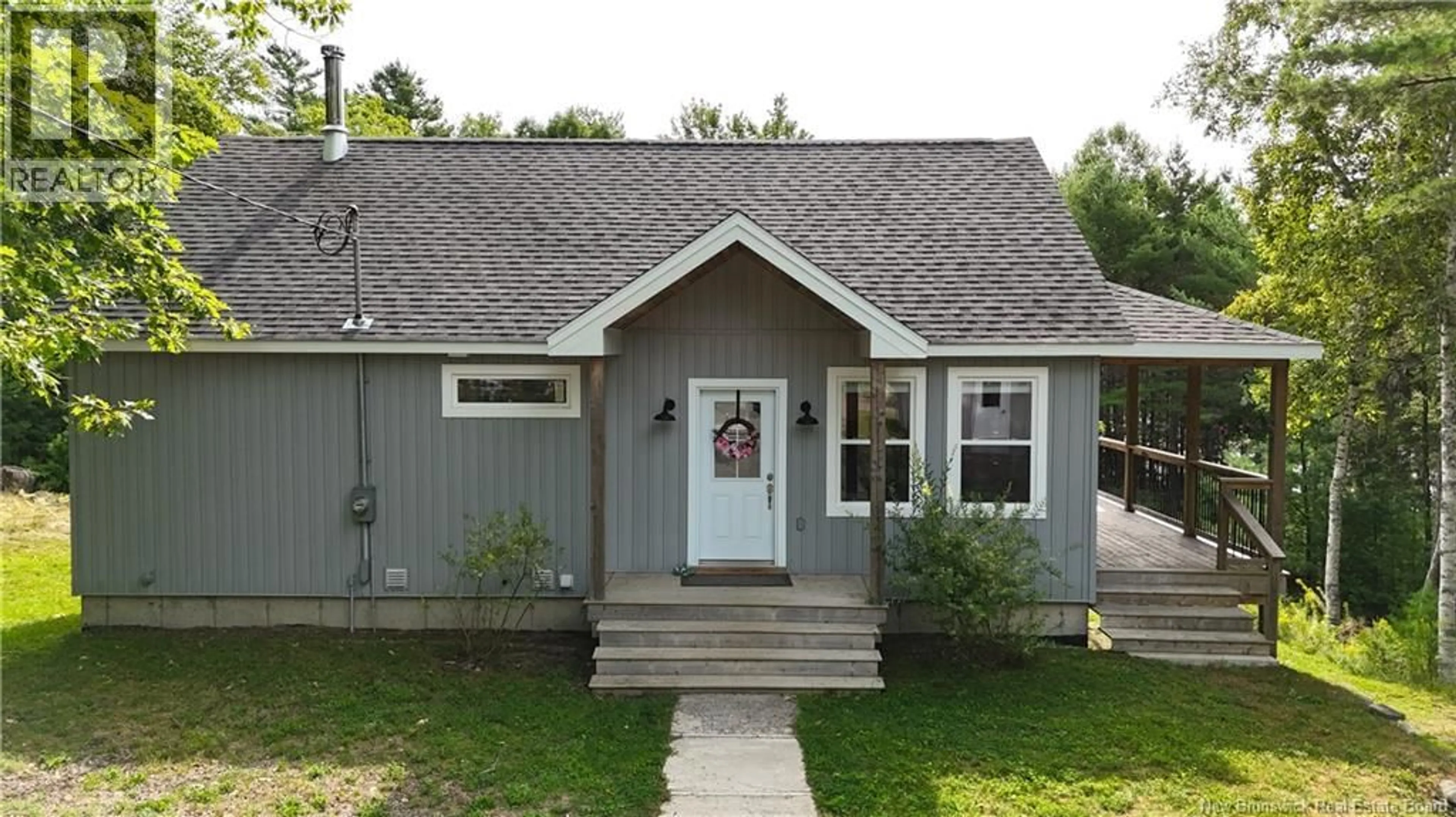 Home with vinyl exterior material, street for 135 PINE POINT ROAD, Dufferin New Brunswick E3L0G7