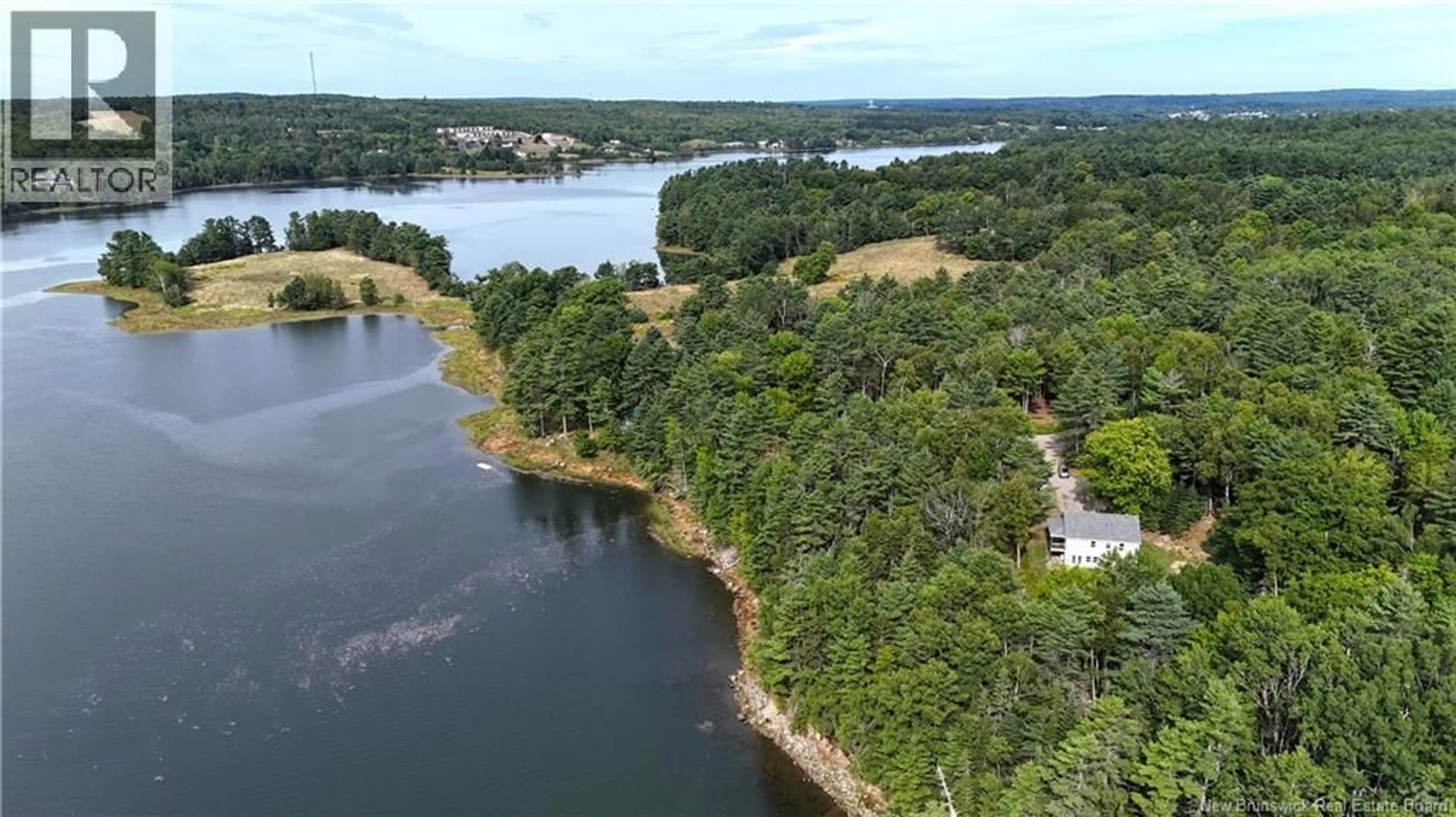 A pic from outside/outdoor area/front of a property/back of a property/a pic from drone, water/lake/river/ocean view for 135 PINE POINT ROAD, Dufferin New Brunswick E3L0G7